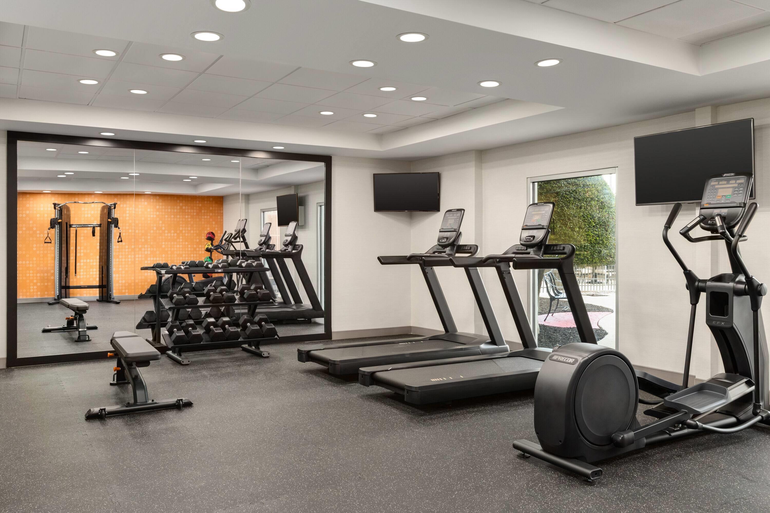 Health club fitness center gym | La Quinta Inn & Suites by Wyndham Dallas Arlington South