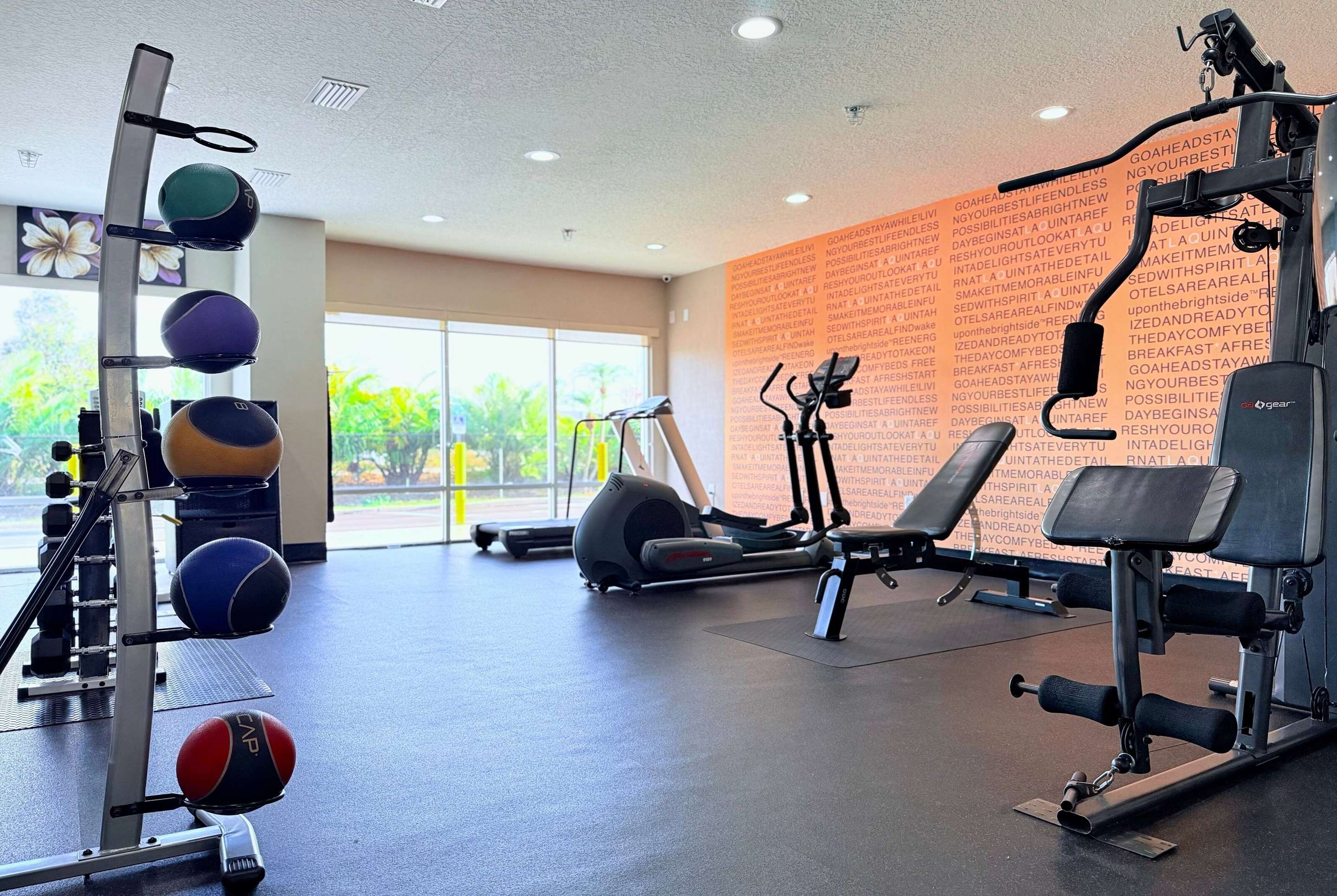 Health club fitness center gym | La Quinta Inn & Suites by Wyndham Orlando Universal area