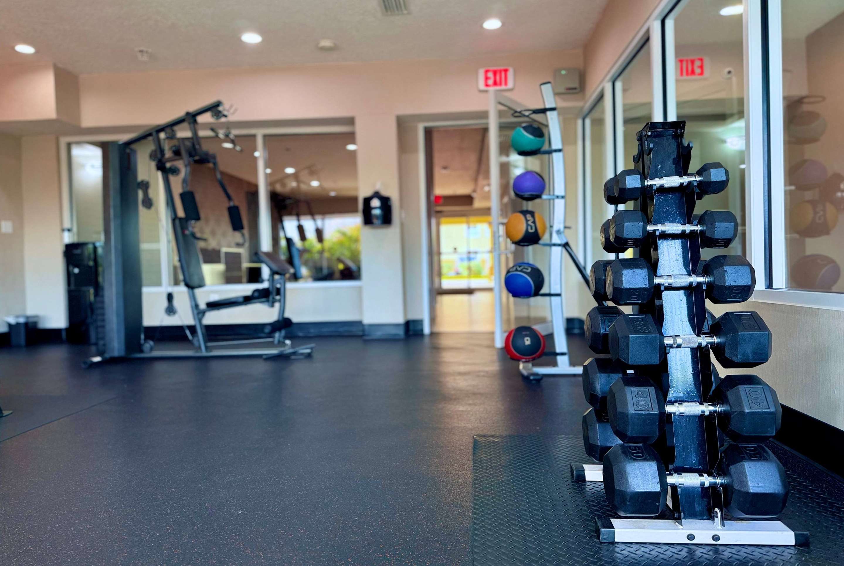 Health club fitness center gym | La Quinta Inn & Suites by Wyndham Orlando Universal area