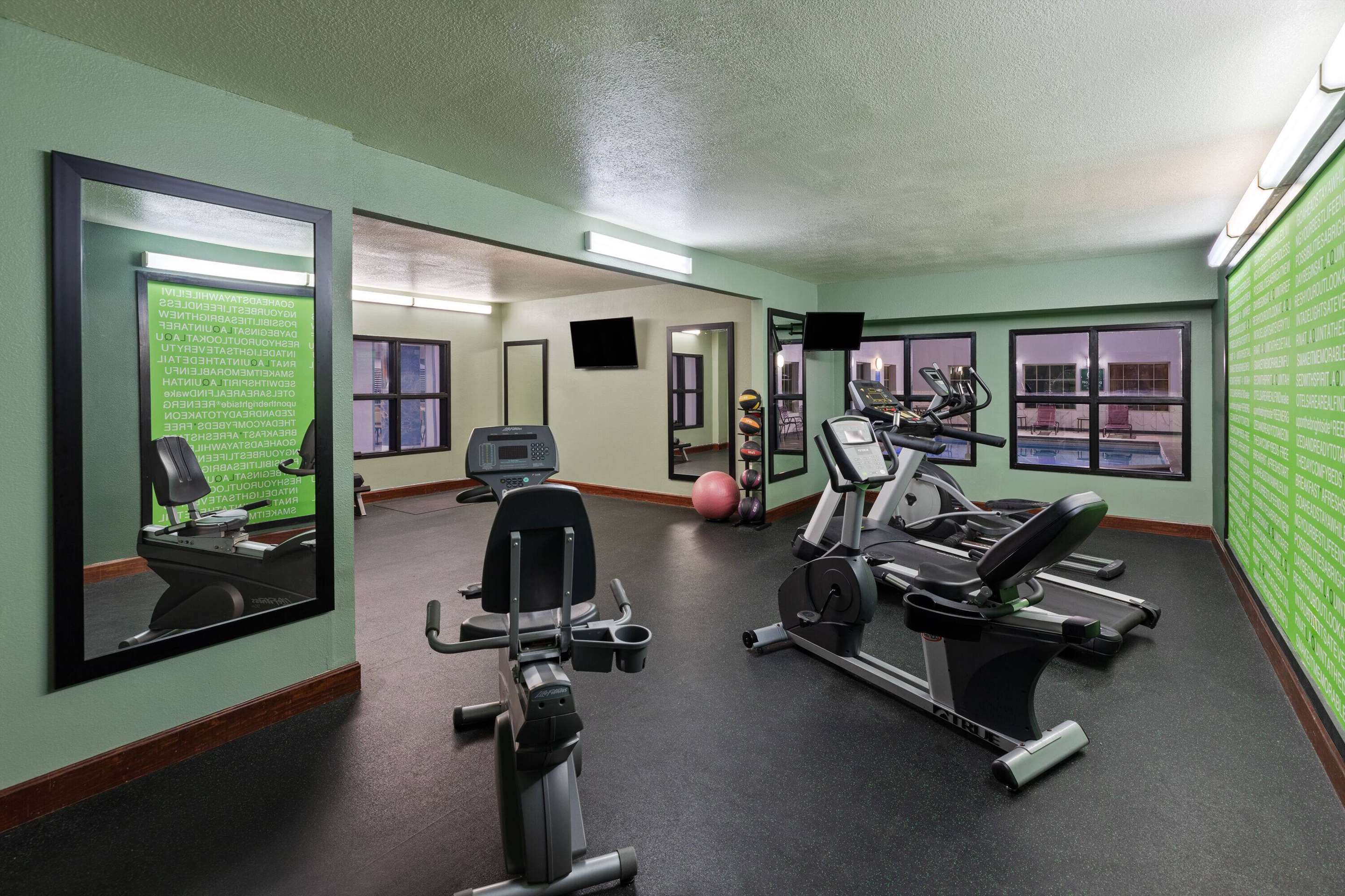 Health club fitness center gym | La Quinta Inn & Suites by Wyndham Olathe