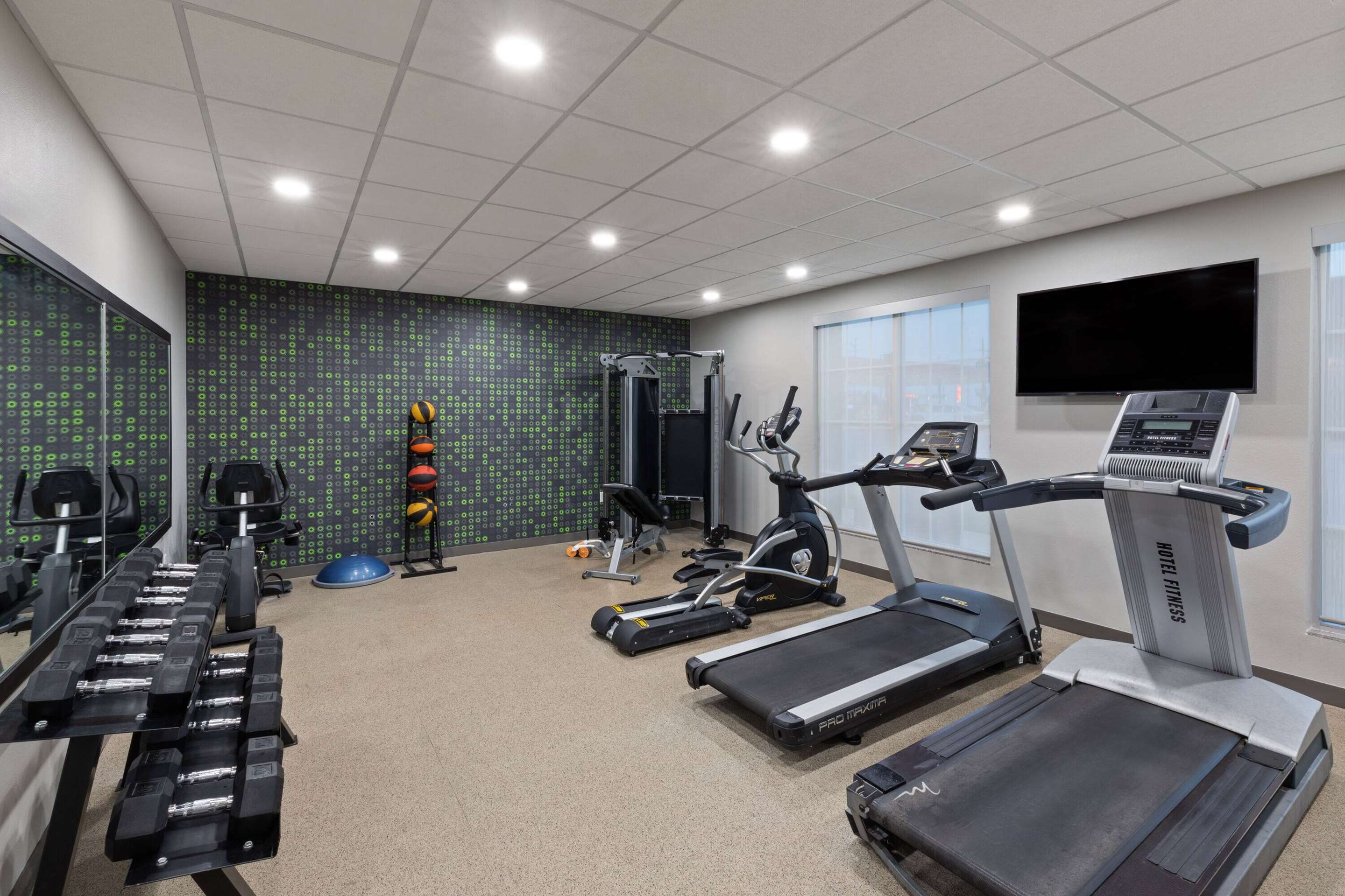 Health club fitness center gym | La Quinta Inn & Suites by Wyndham McAlester