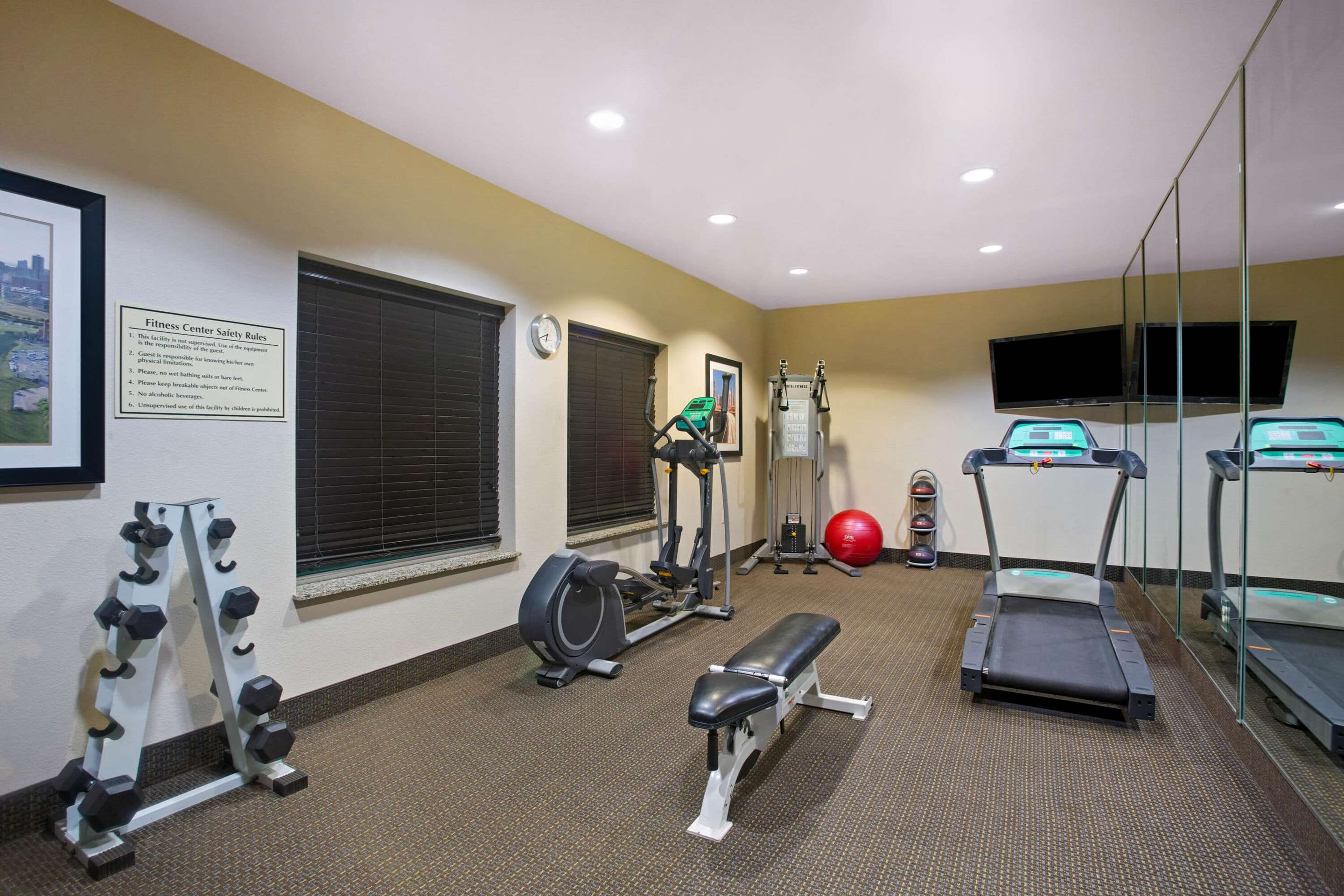 Health club fitness center gym | La Quinta Inn & Suites by Wyndham Pearsall