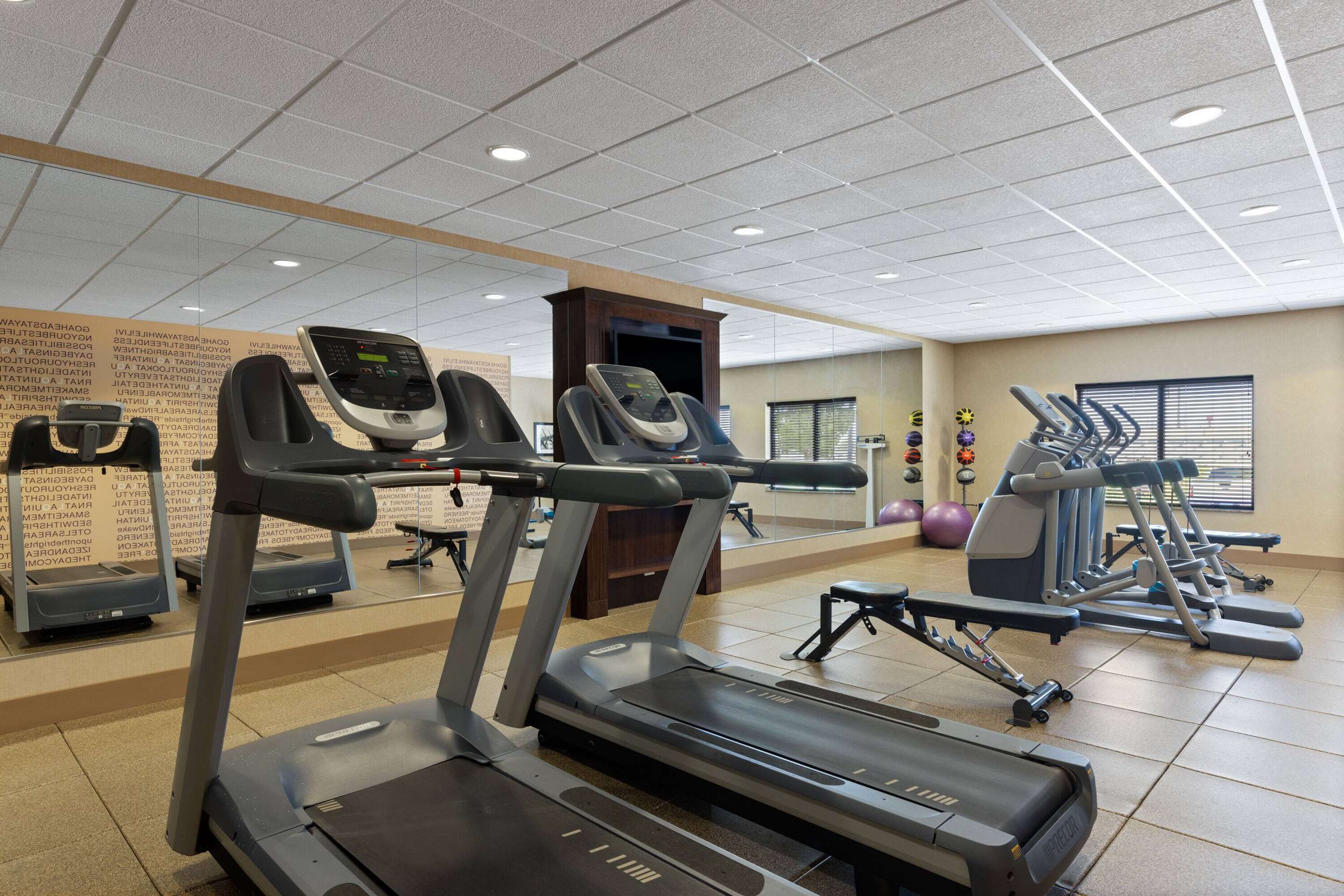 Health club fitness center gym | La Quinta Inn & Suites by Wyndham Sioux Falls