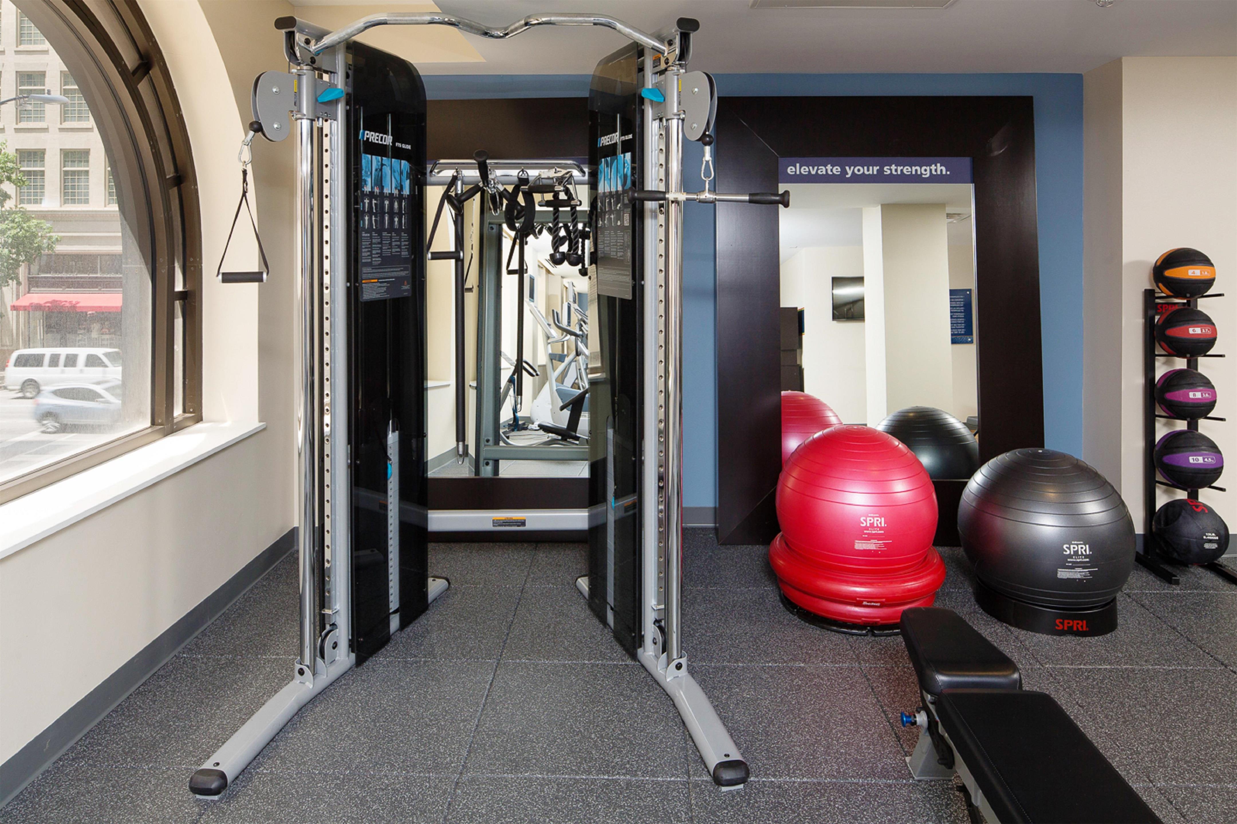 Health club fitness center gym | Hampton Inn & Suites Dallas Downtown