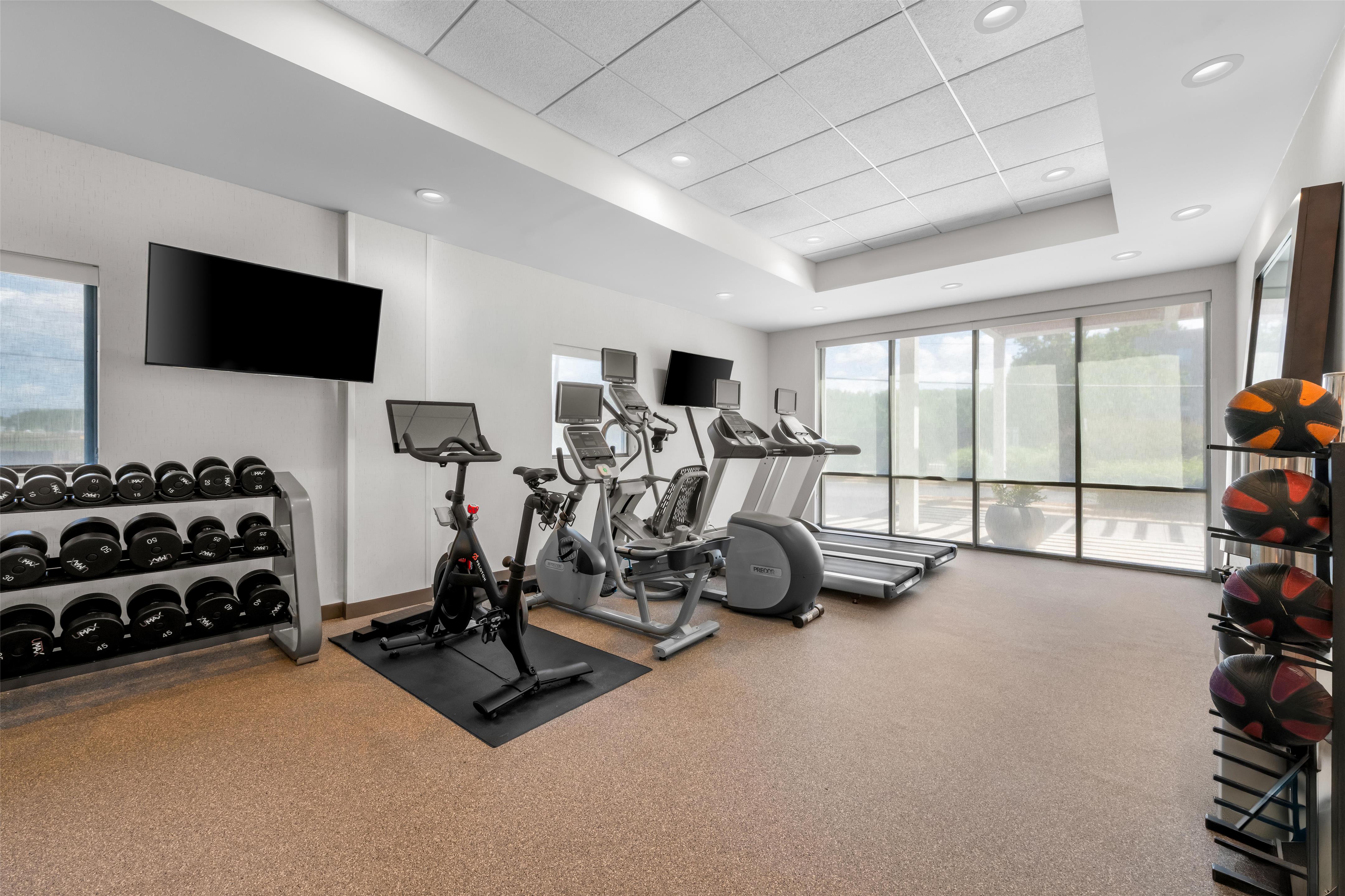 Health club fitness center gym | Home2 Suites by Hilton Charlotte Airport