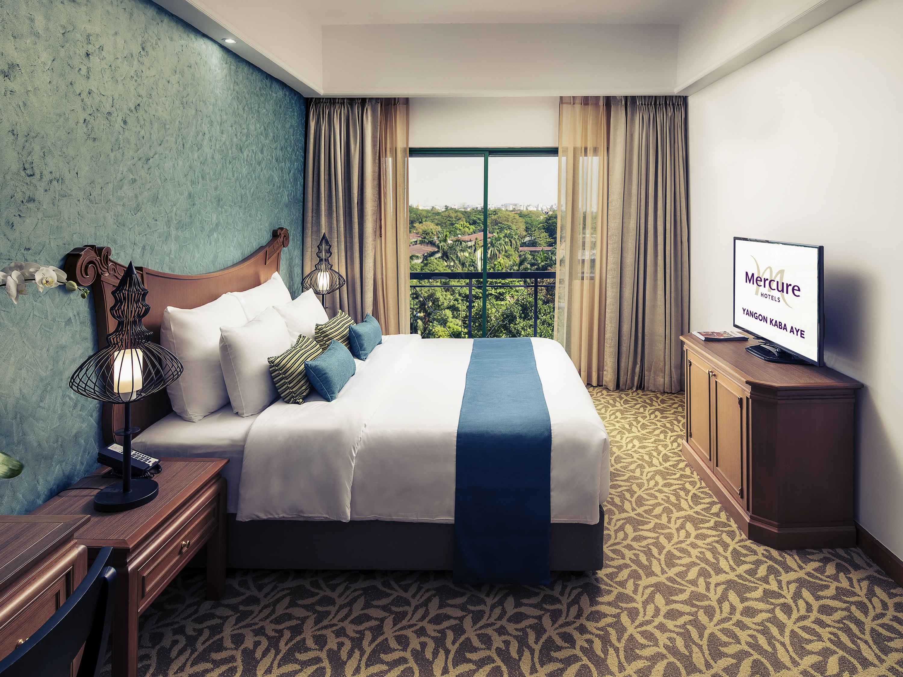 Mercure Yangon Kaba Aye Room Type - Two Bedroom King Size Bed and Two Single Beds-Living Room-Kitchenette-Balcony Mercure Yangon Kaba Aye Room Type - Two Bedroom King Size Bed and Two Single Beds-Living Room-Kitchenette-Balcony