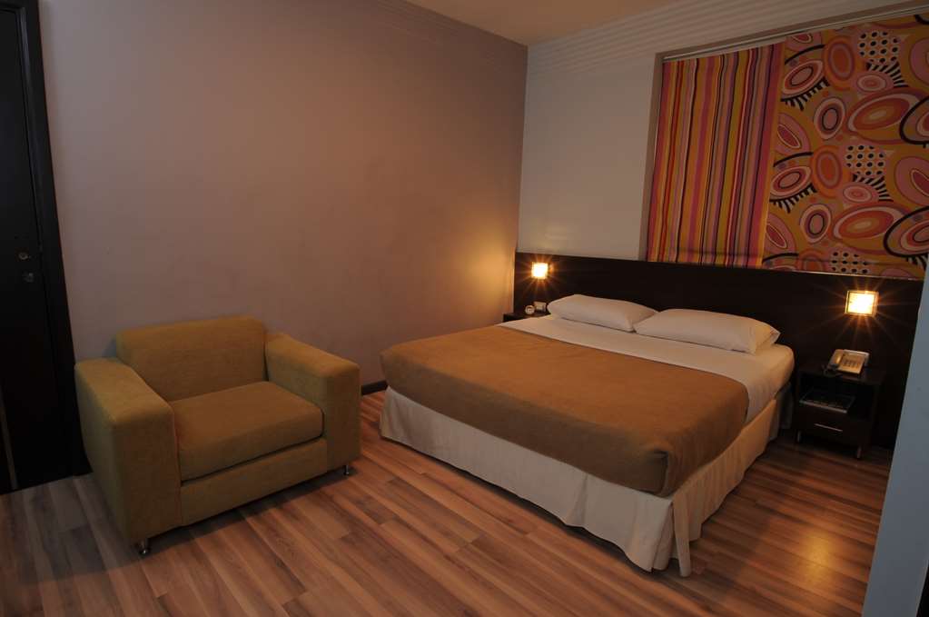SUITE HOTEL MERLOT-guestroom-Guest Room,On-Site.jpg