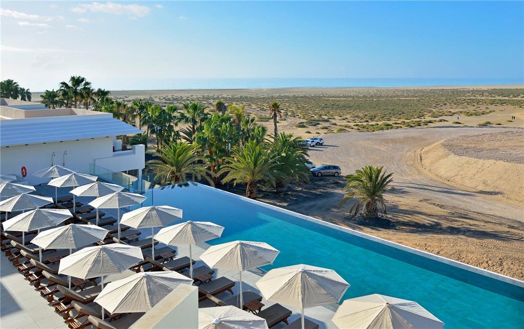 INNSIDE FUERTEVENTURA-guestroom-Guest Room,Guest Room Amenity,Pool,Architecture,On-Site,Outdoor/Exterior,View from above,Exterior View of Building,Family.jpg