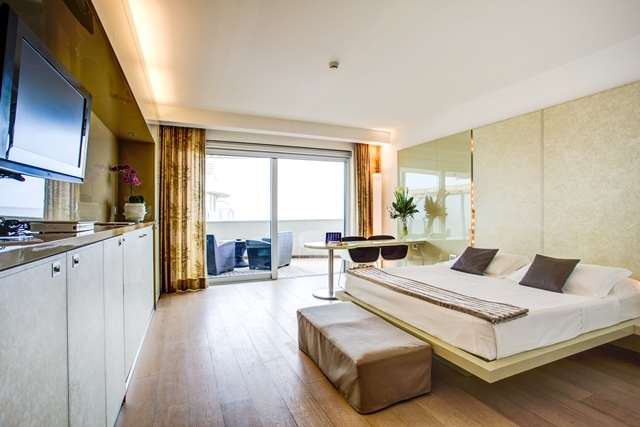 HOTEL PREMIER AND SUITES-guestroom-Guest Room,On-Site.jpg