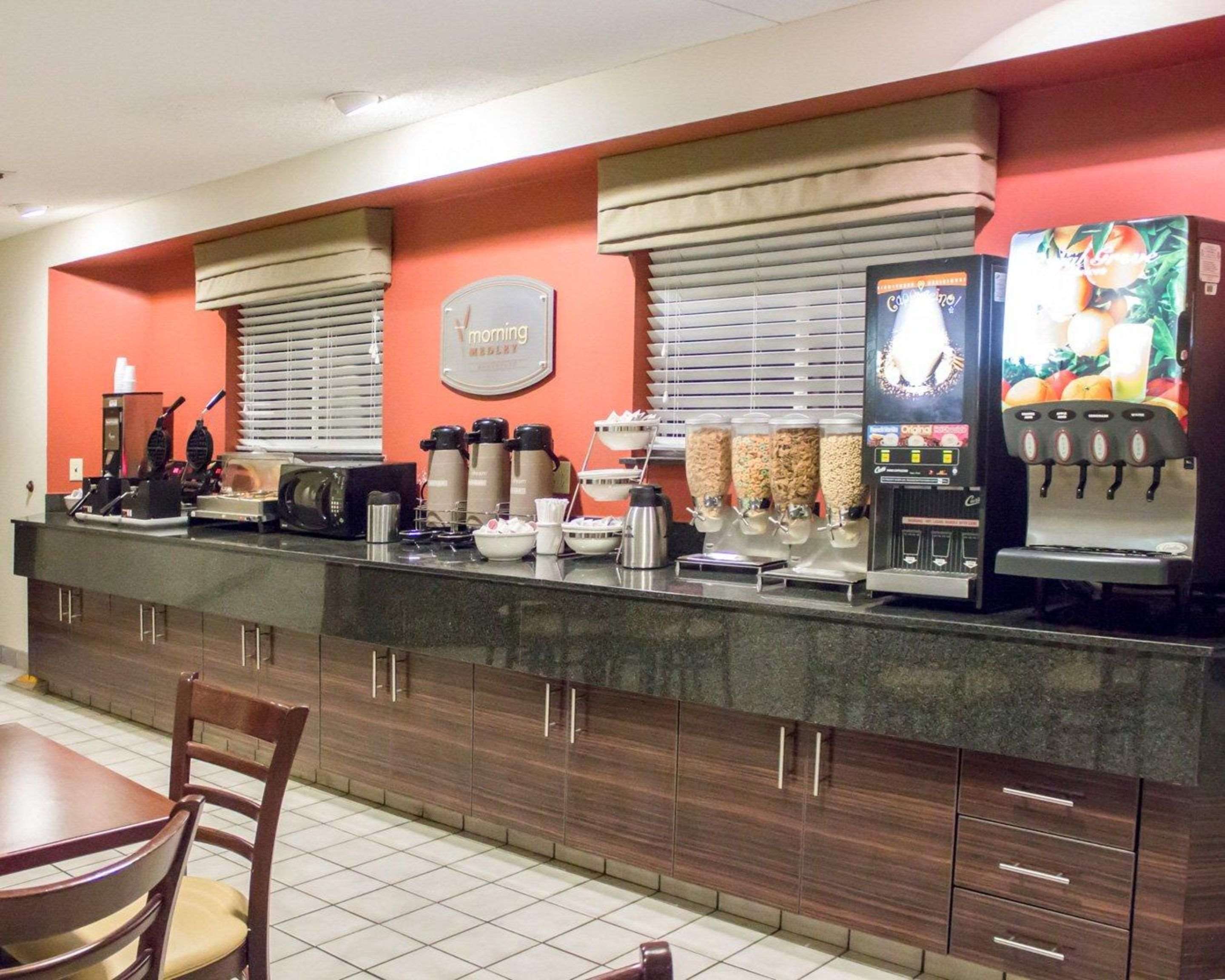 Enjoy breakfast in this seating area | Sleep Inn Pelham Oak Mountain