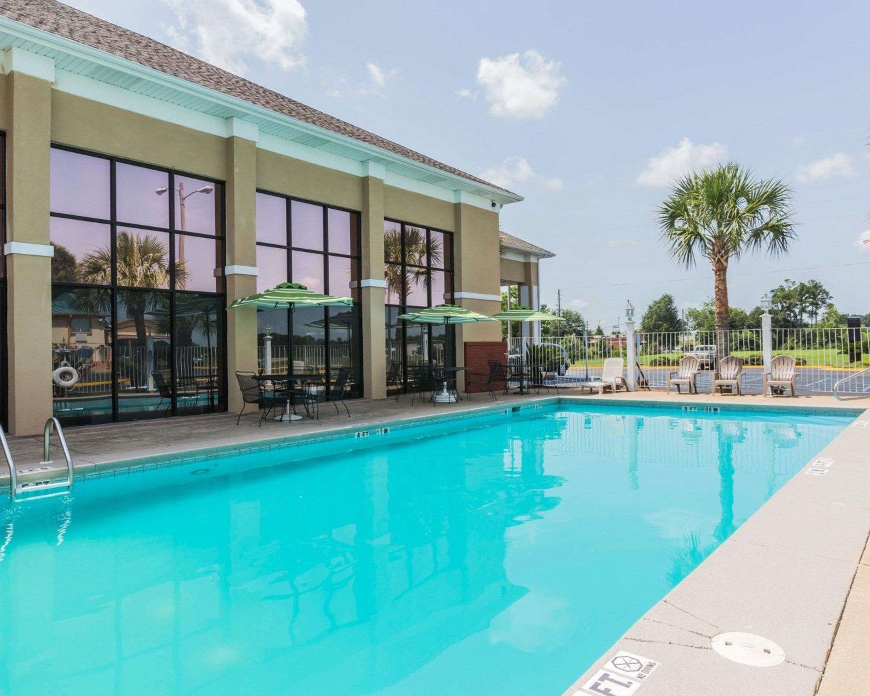 Outdoor pool with sundeck | Quality Inn & Suites North Montgomery