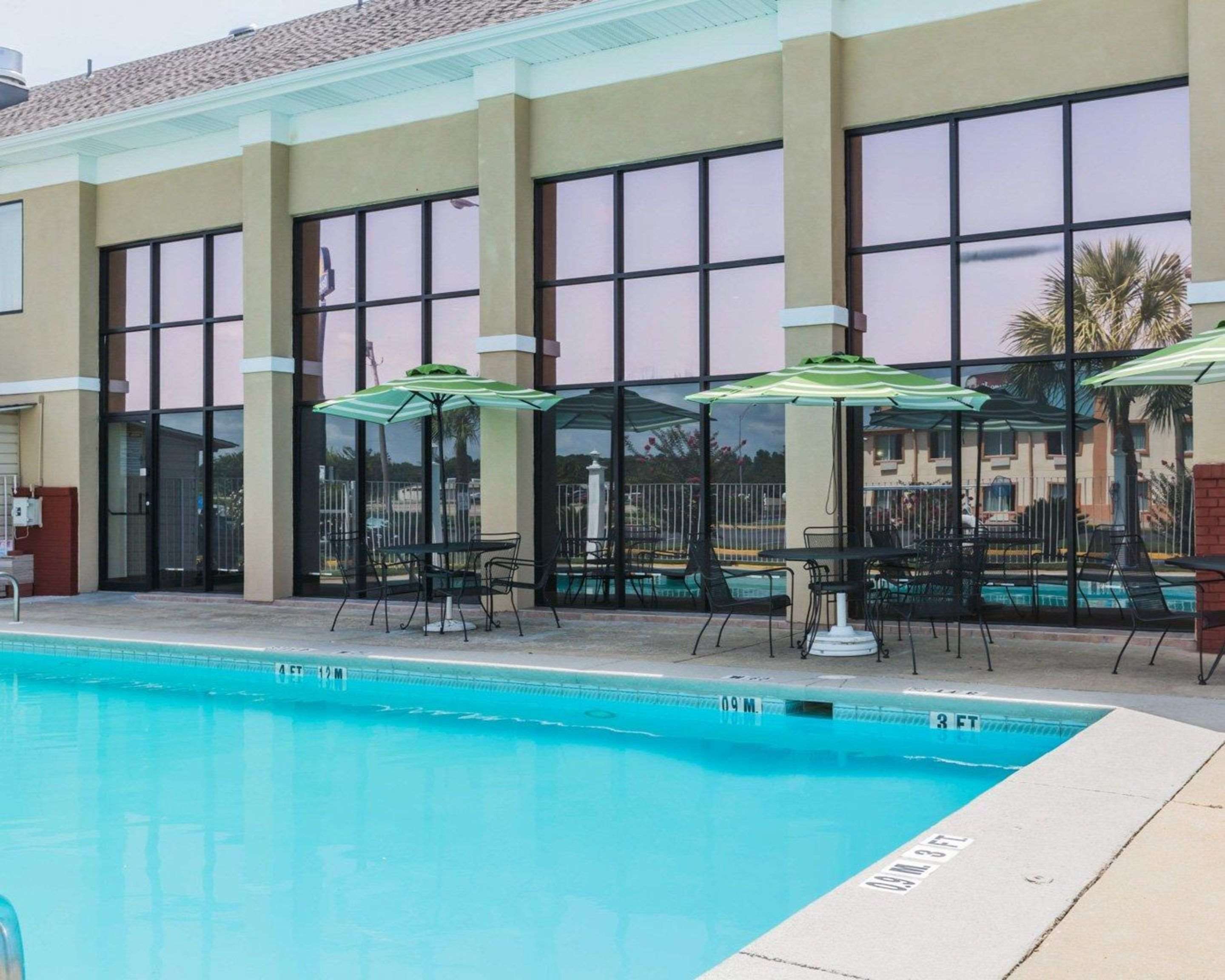 Outdoor pool with sundeck | Quality Inn & Suites North Montgomery