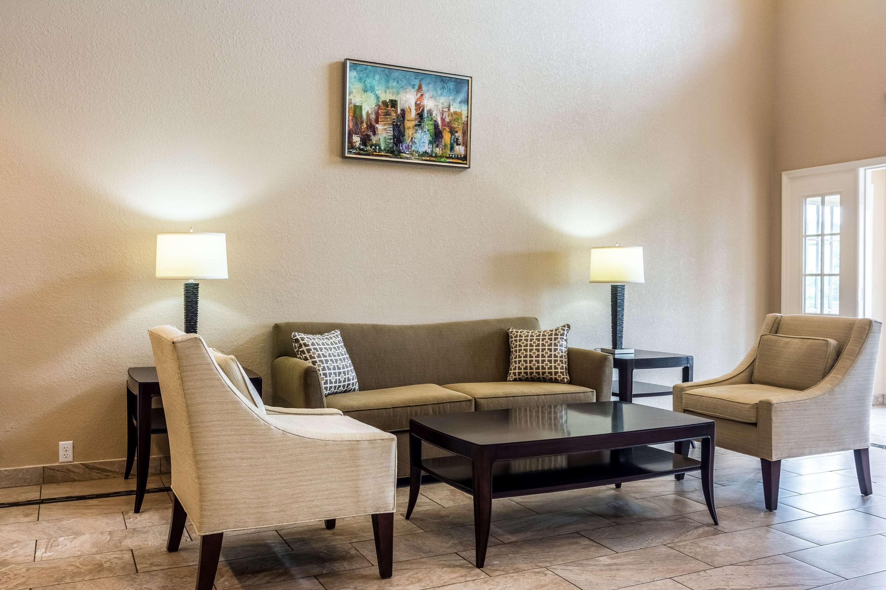 Spacious lobby with sitting area | Quality Inn University Area