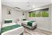 Guest room with one queen bed and two single beds