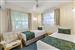 Guest room with one queen bed and two single beds