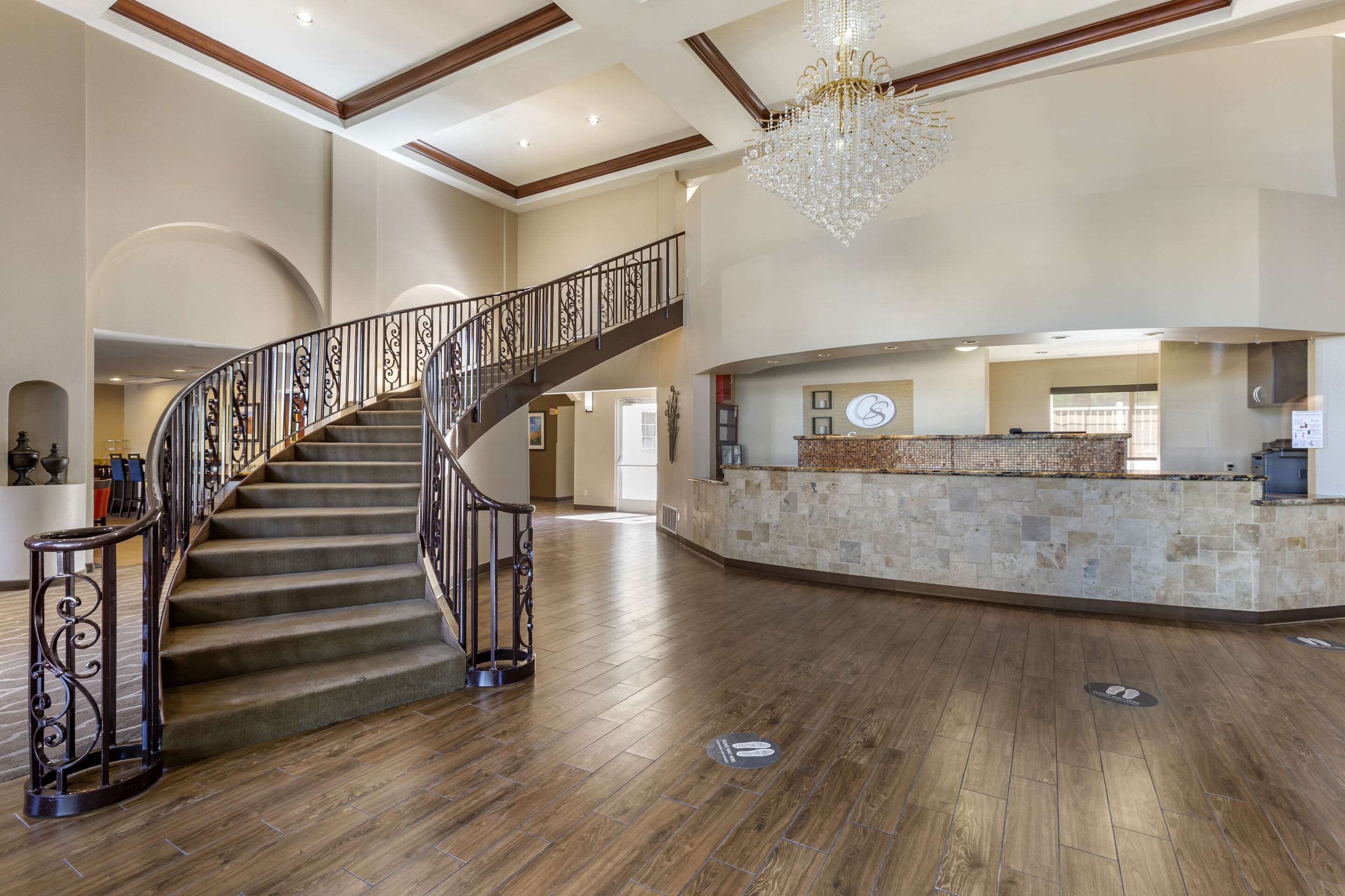 Spacious lobby with sitting area | Comfort Suites Phoenix Airport