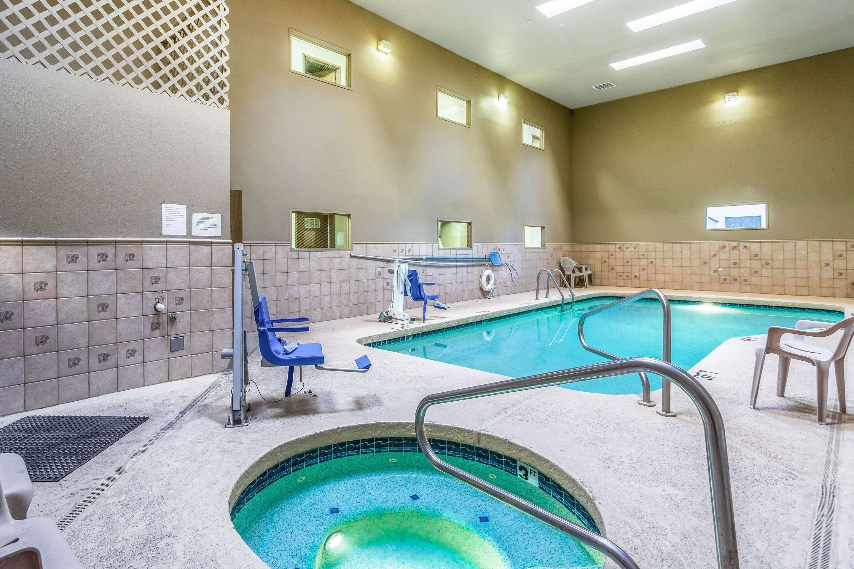 Indoor pool with hot tub | Rodeway Inn and Suites