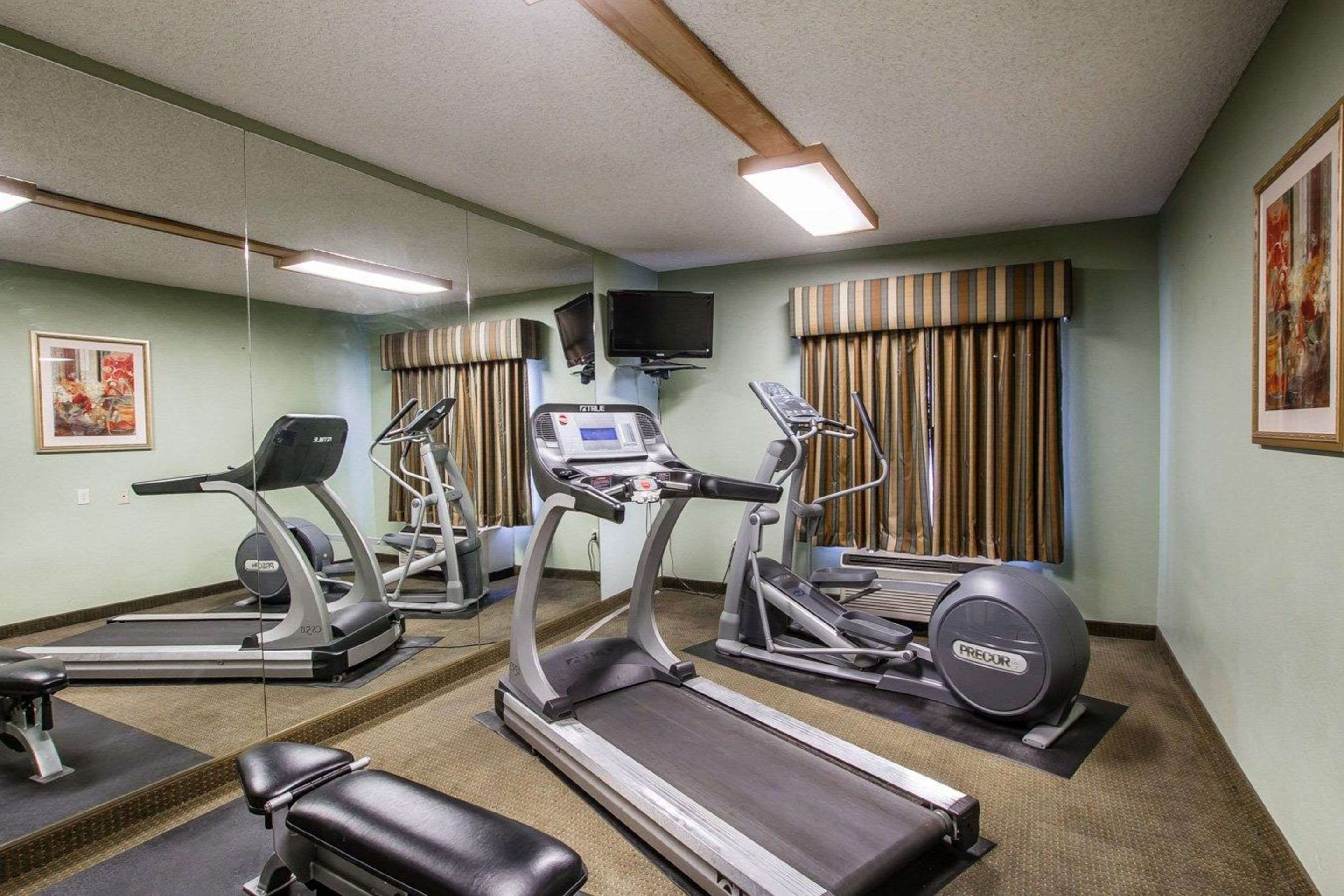 Fitness center with cardio equipment and weights