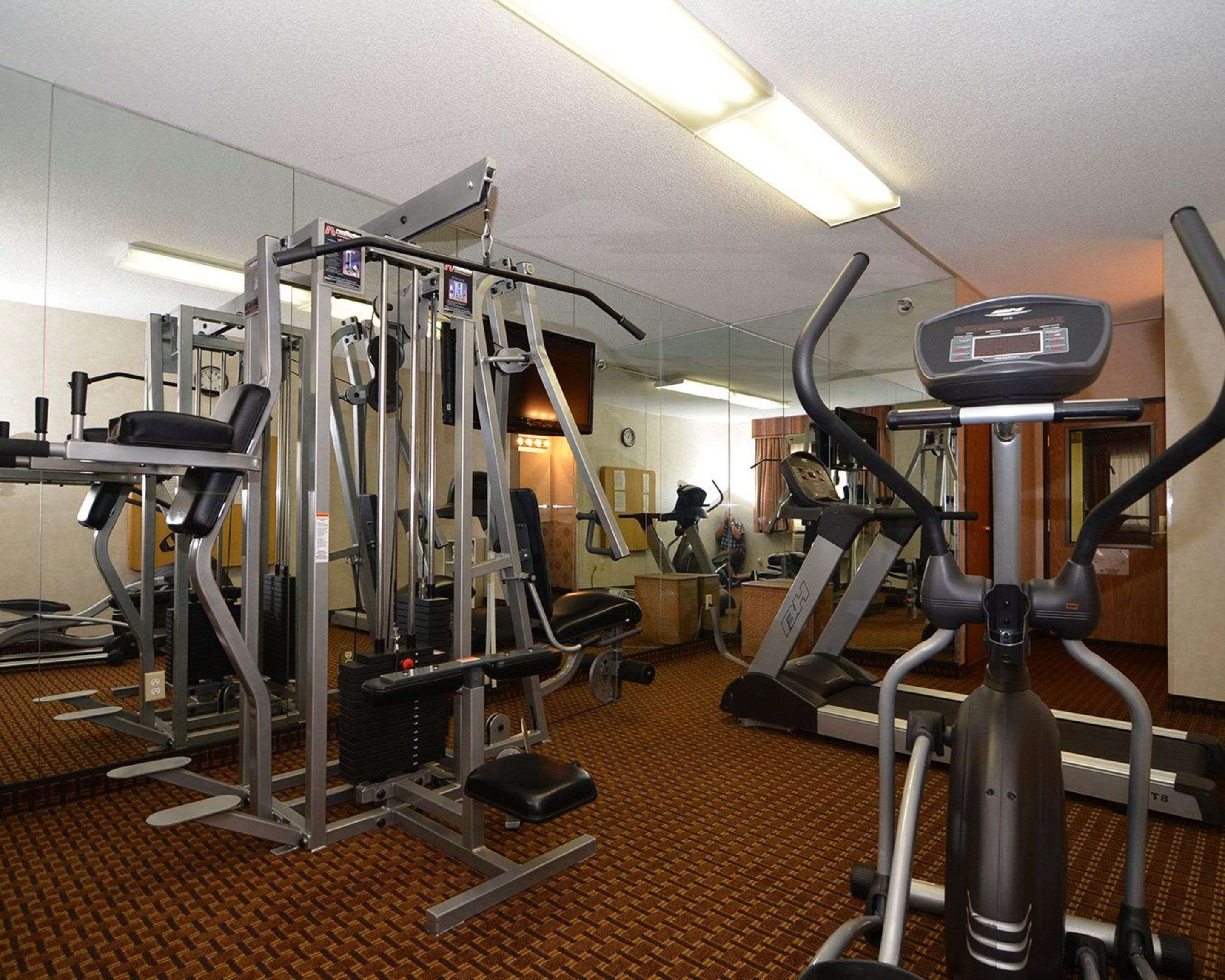 Exercise room with cardio equipment and weights | Quality Inn & Suites Yuma