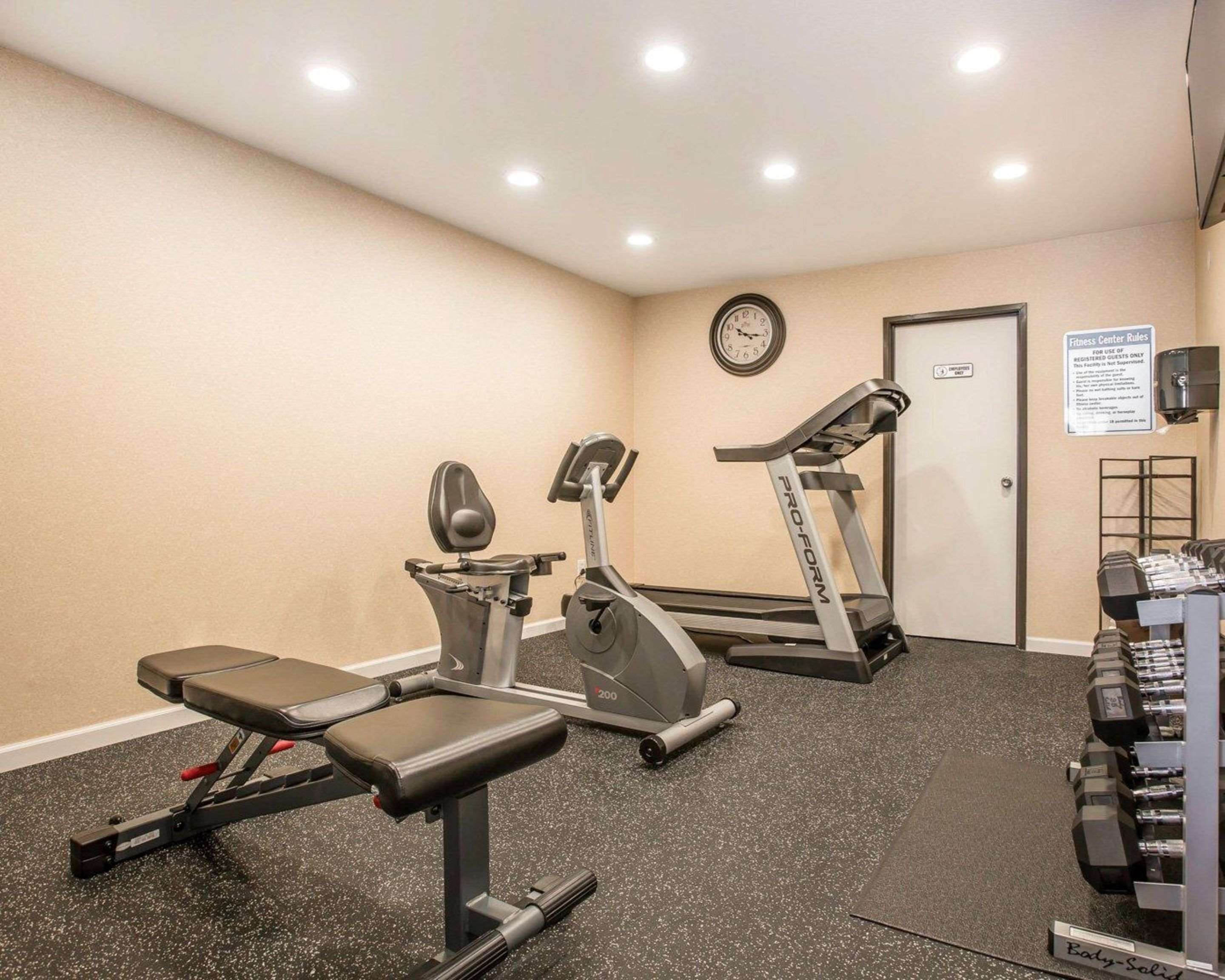 Fitness center with cardio equipment and weights