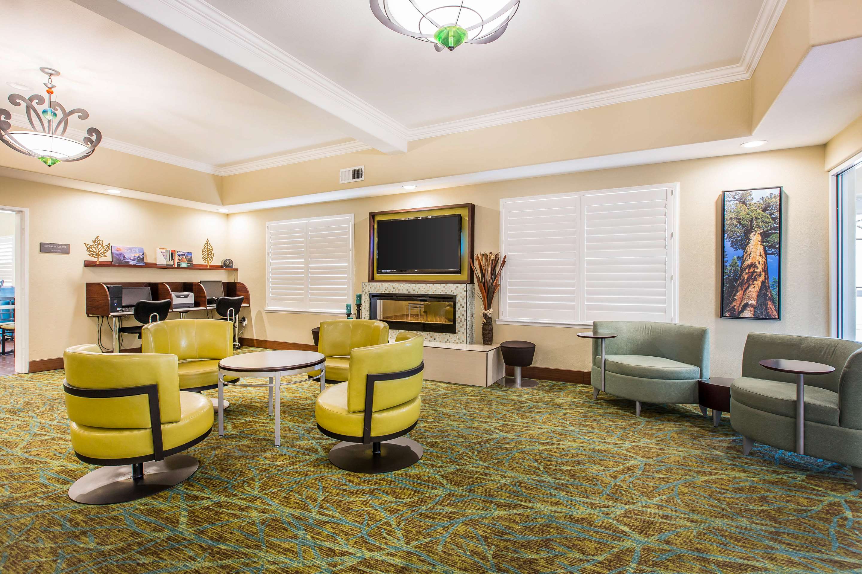 Spacious lobby with sitting area | Comfort Suites Fresno River Park