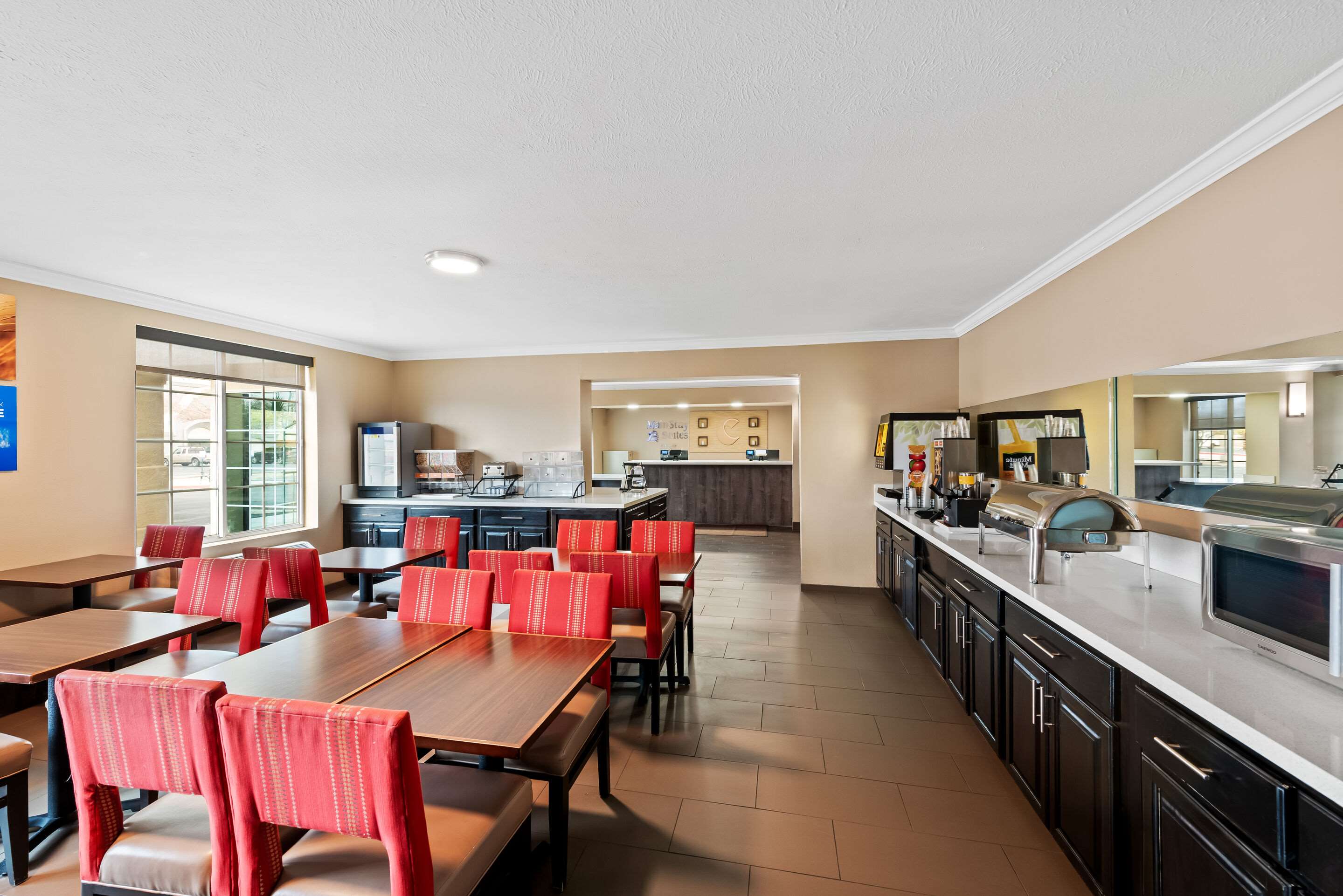 Enjoy breakfast in this seating area | Comfort Inn & Suites El Centro I - 8