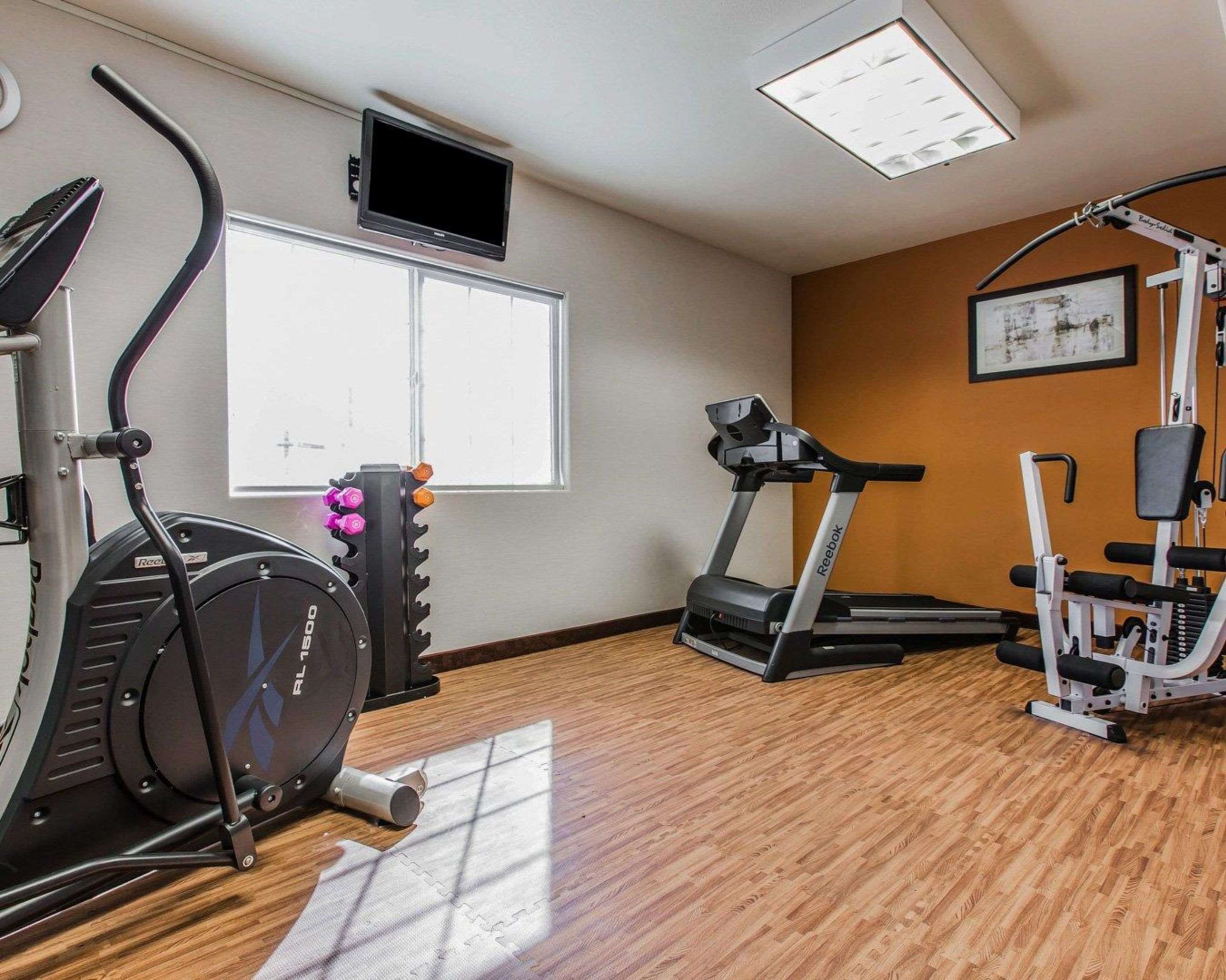 Fitness center with cardio equipment and weights | Quality Inn Rosemead - Los Angeles