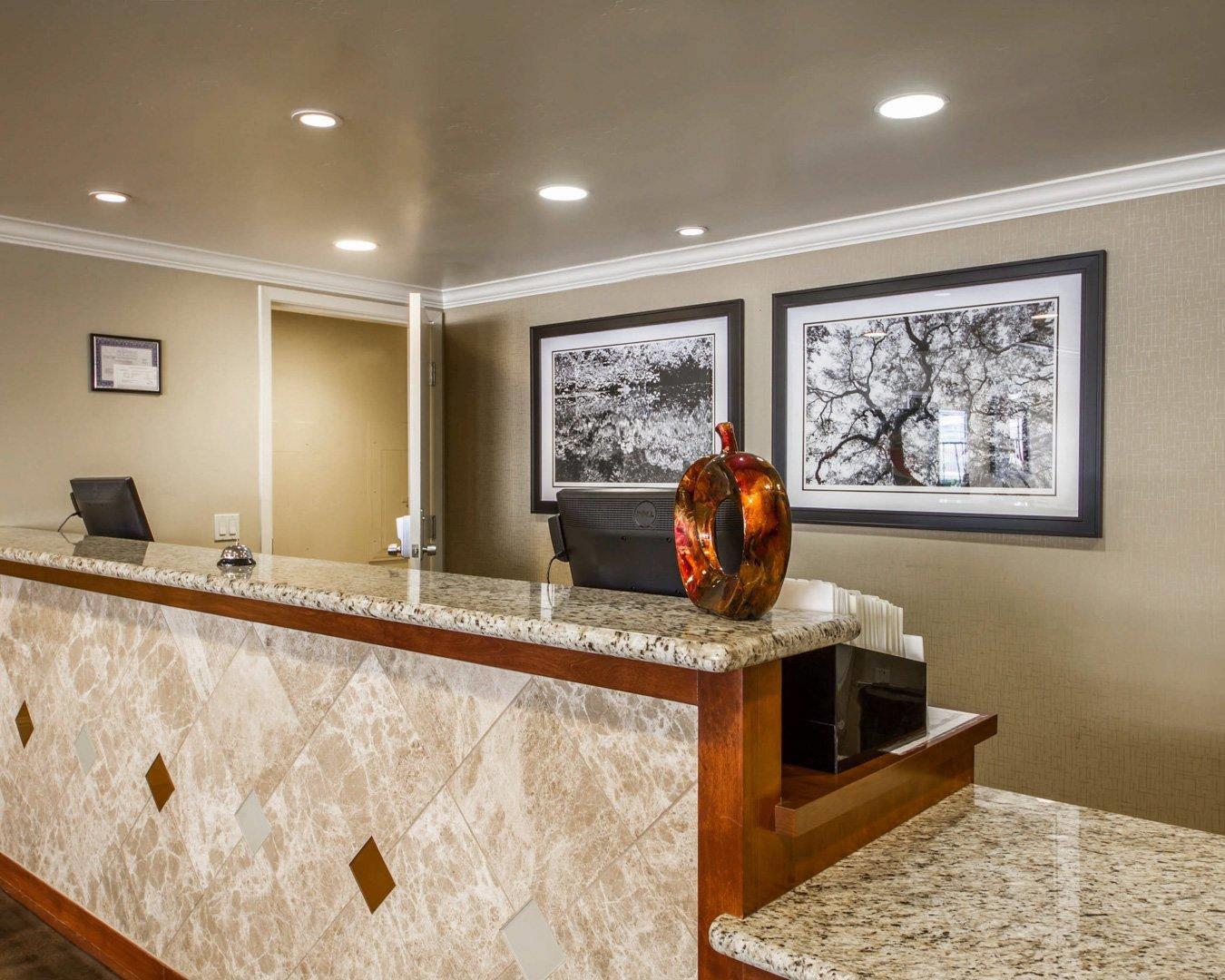 Front desk with friendly staff | Hotel Med Park, Ascend Hotel Collection