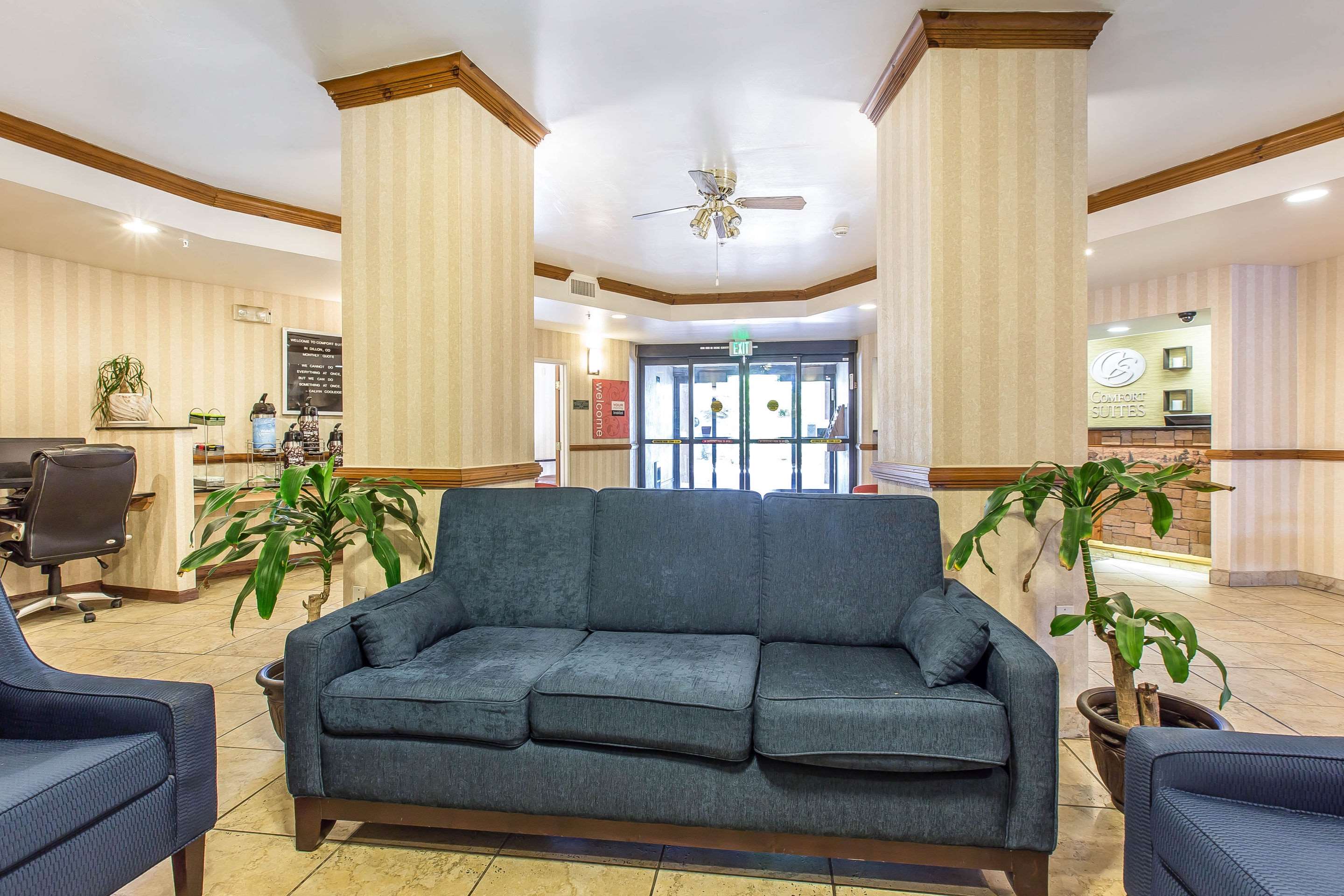 Spacious lobby with sitting area | Comfort Suites