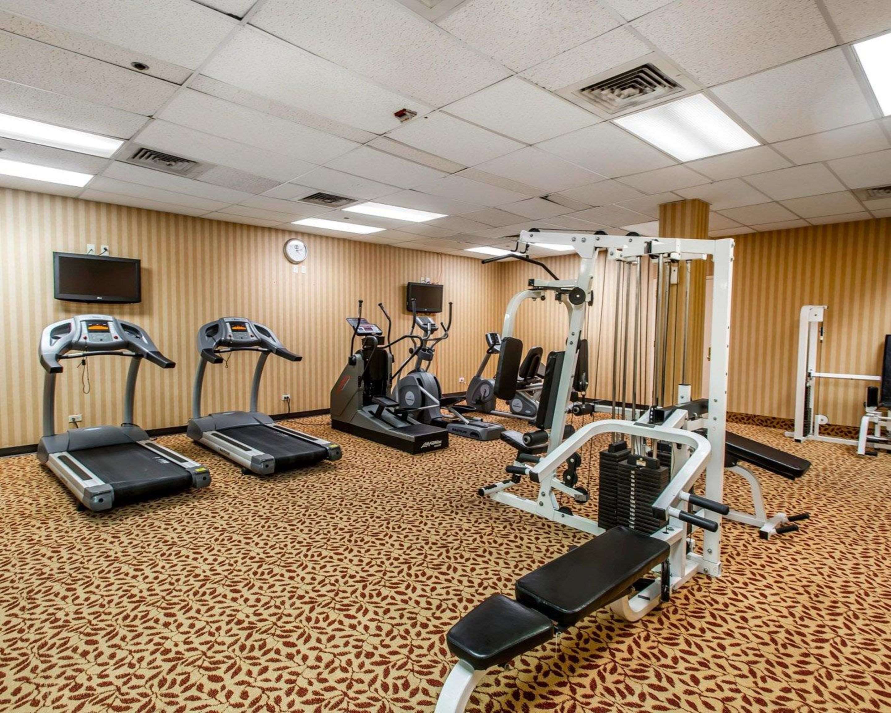 Fitness center with cardio equipment and weights