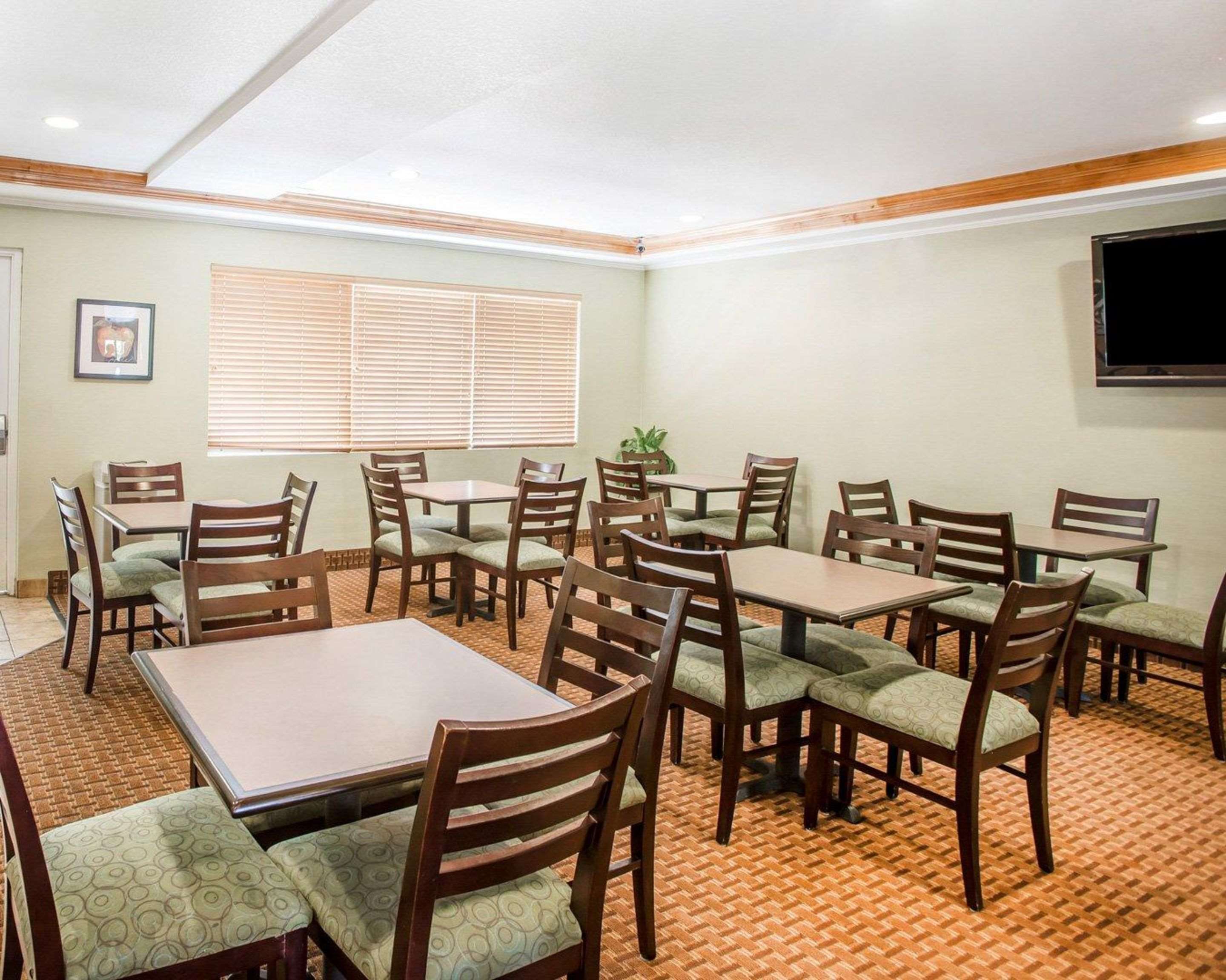 Enjoy breakfast in this seating area | Quality Inn & Suites Denver International Airport