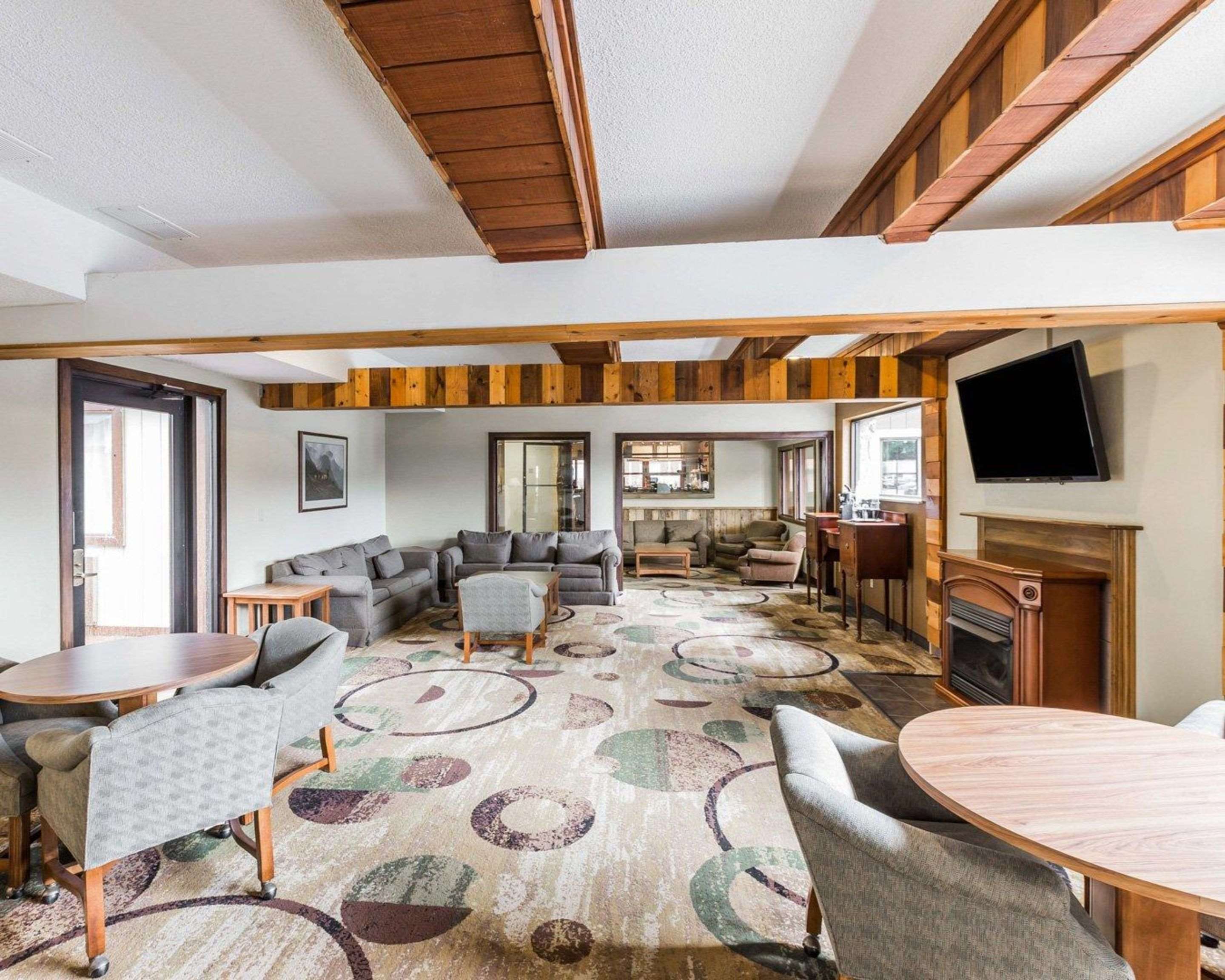 Relax by the fireplace in the lobby | Quality Inn Pagosa Springs
