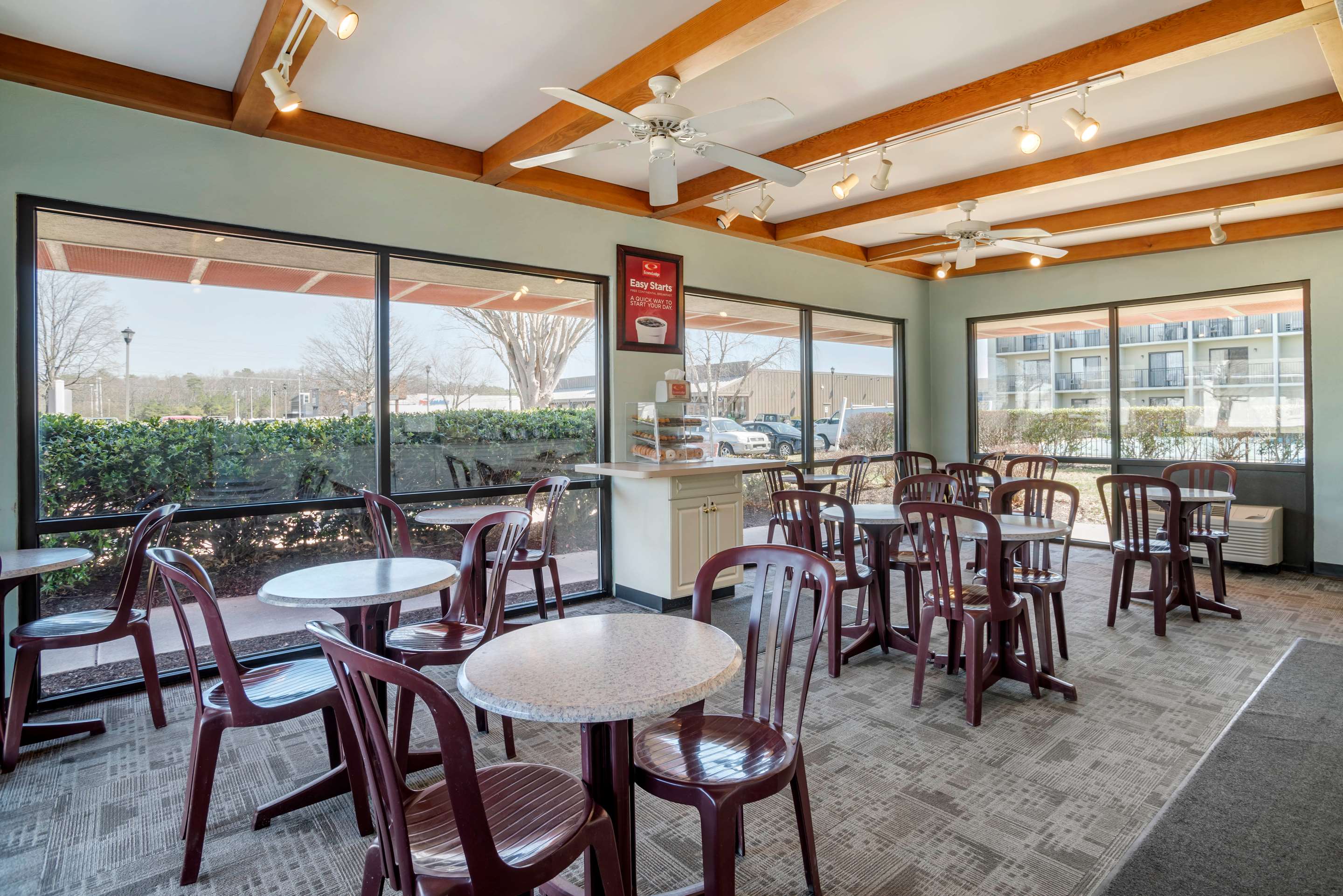 Enjoy breakfast in this seating area | Econo Lodge Inn & Suites - Rehoboth Beach