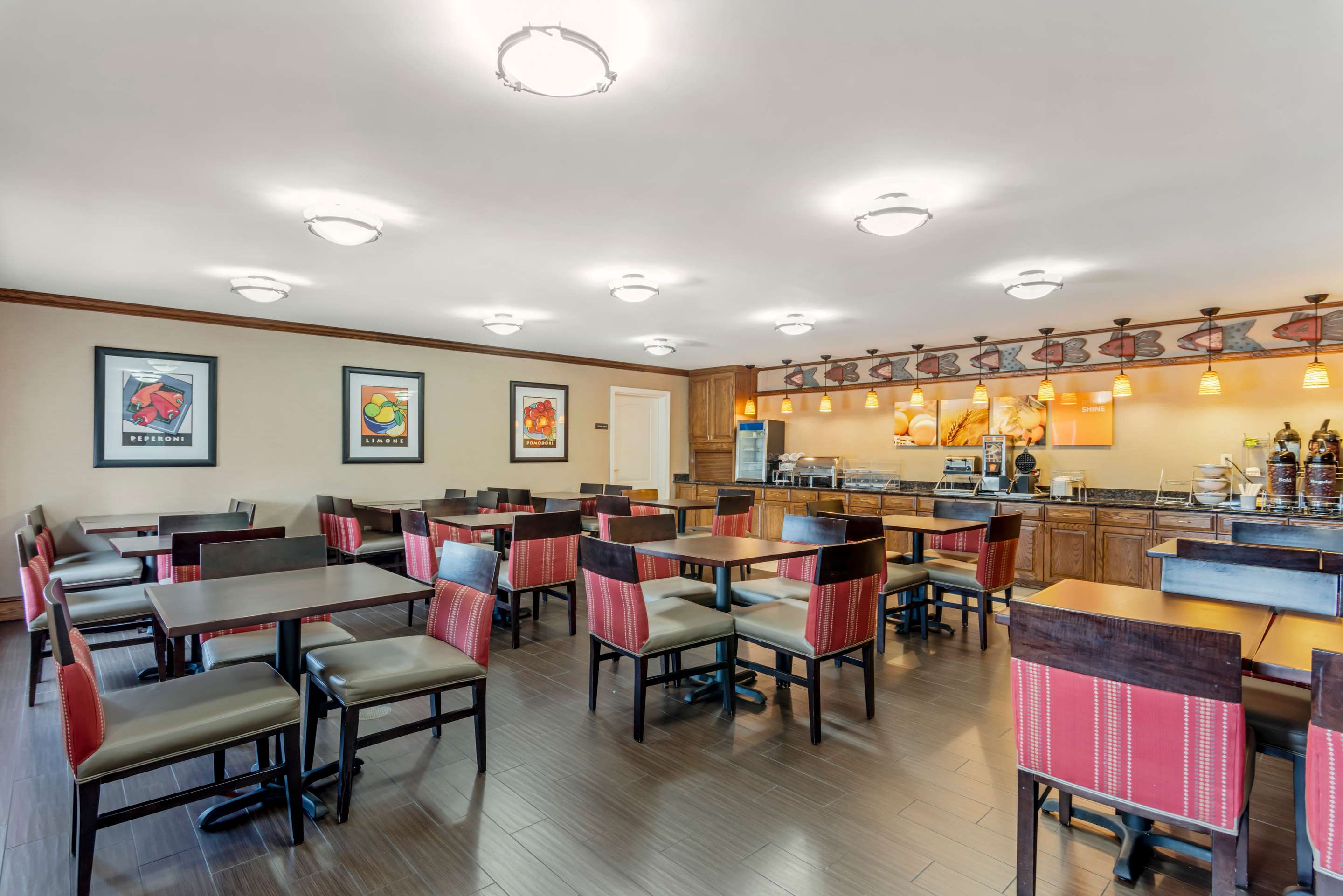 Enjoy breakfast in this seating area | Comfort Inn & Suites Dover