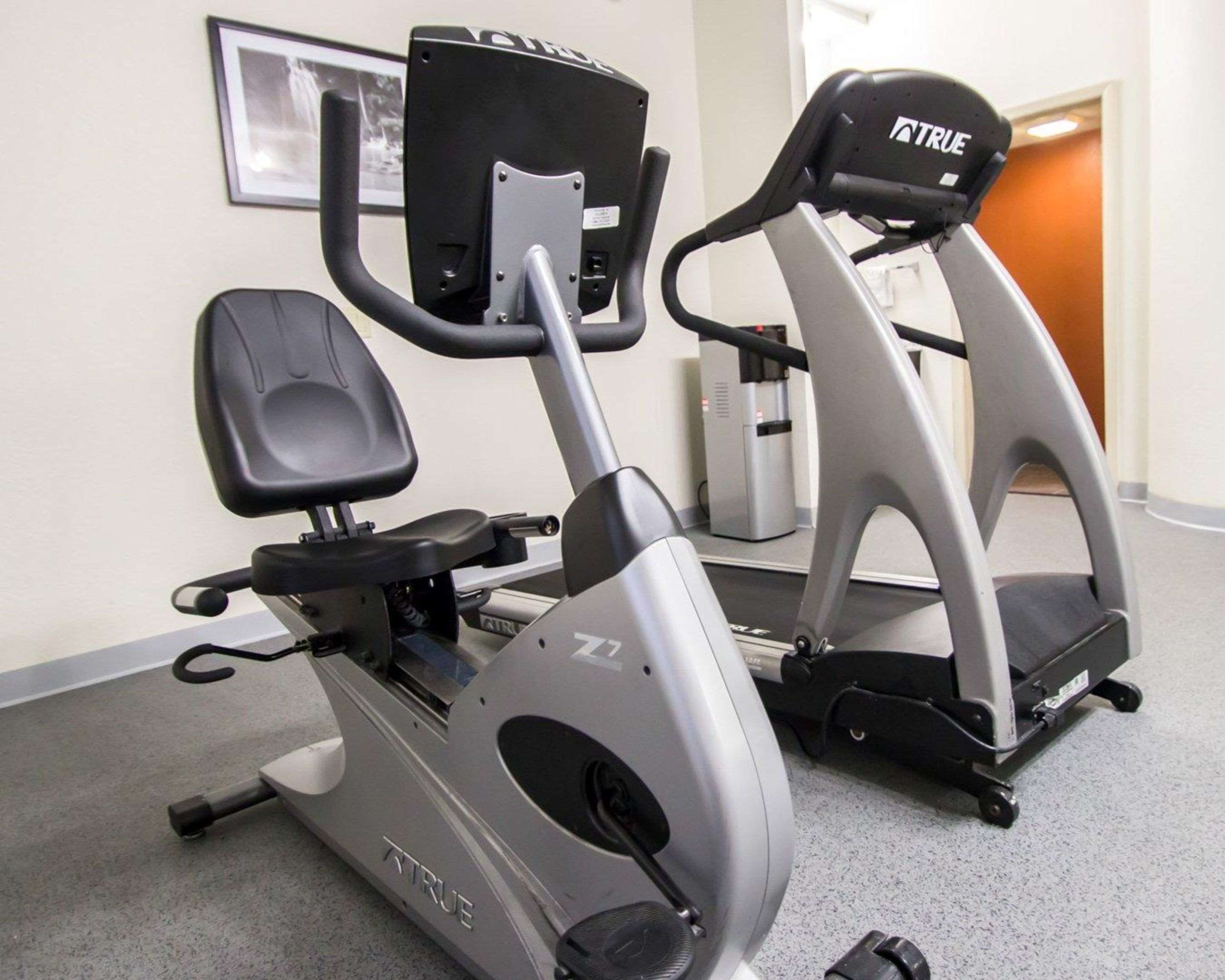 Exercise room with cardio equipment | Sleep Inn Ormond Beach - Daytona