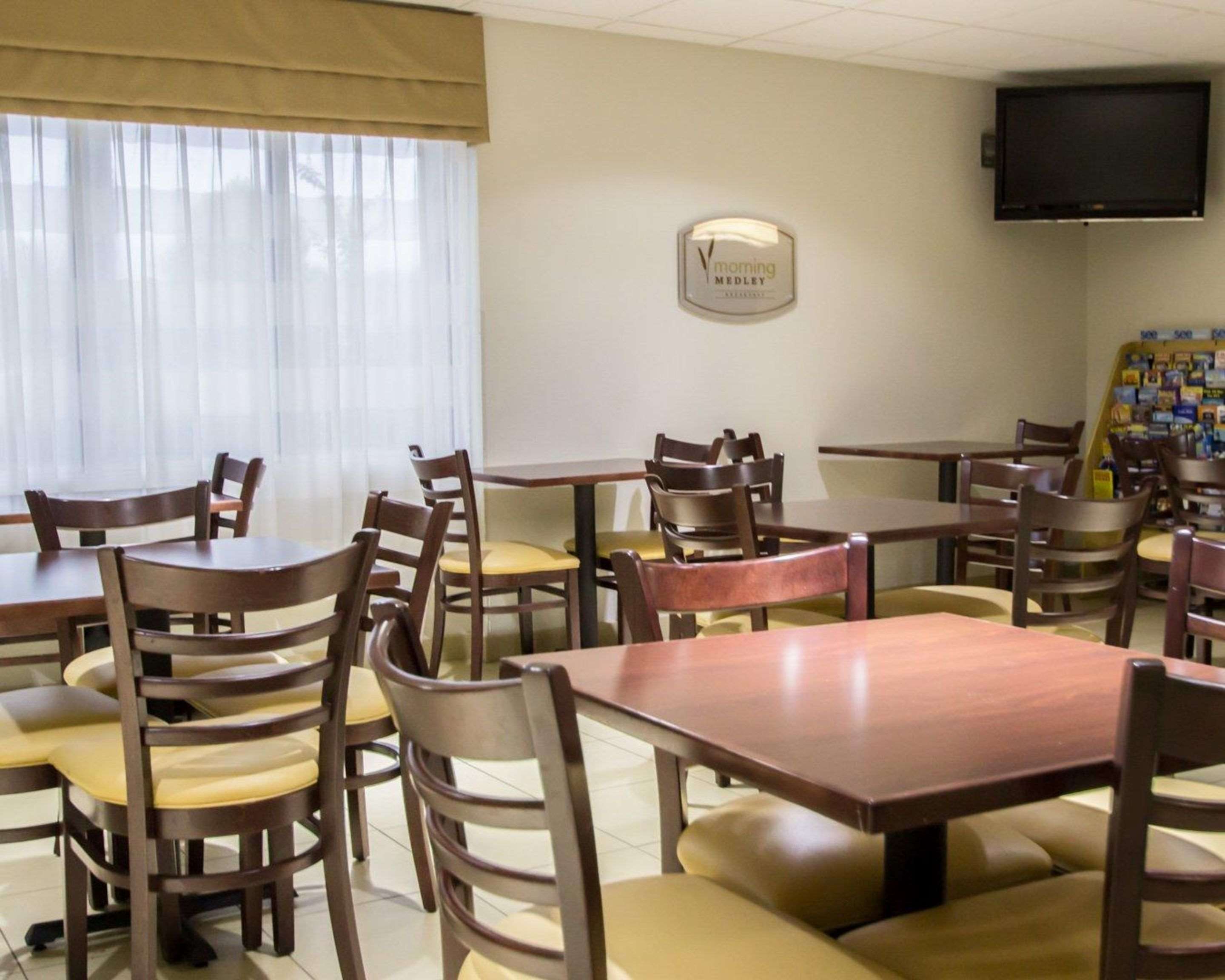 Enjoy breakfast in this seating area | Sleep Inn Ormond Beach - Daytona