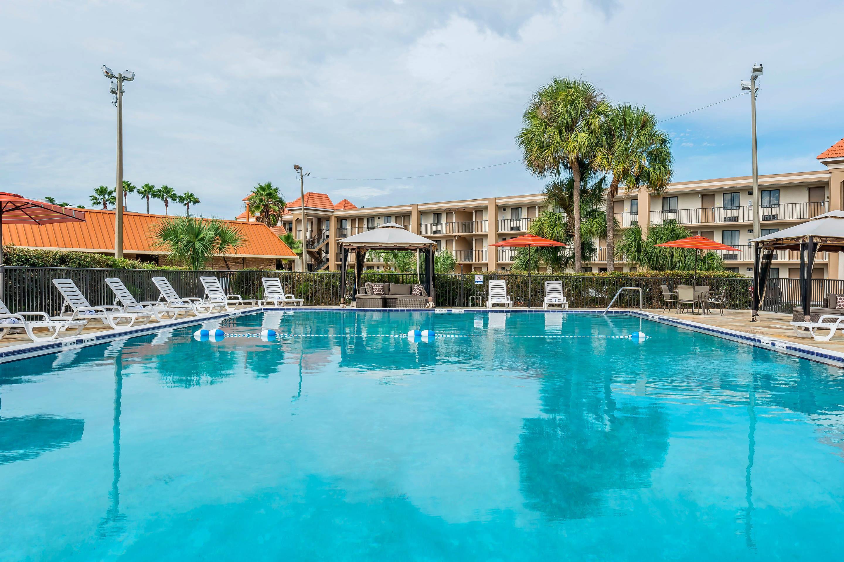 Relax by the pool | Quality Inn & Suites By The Lake