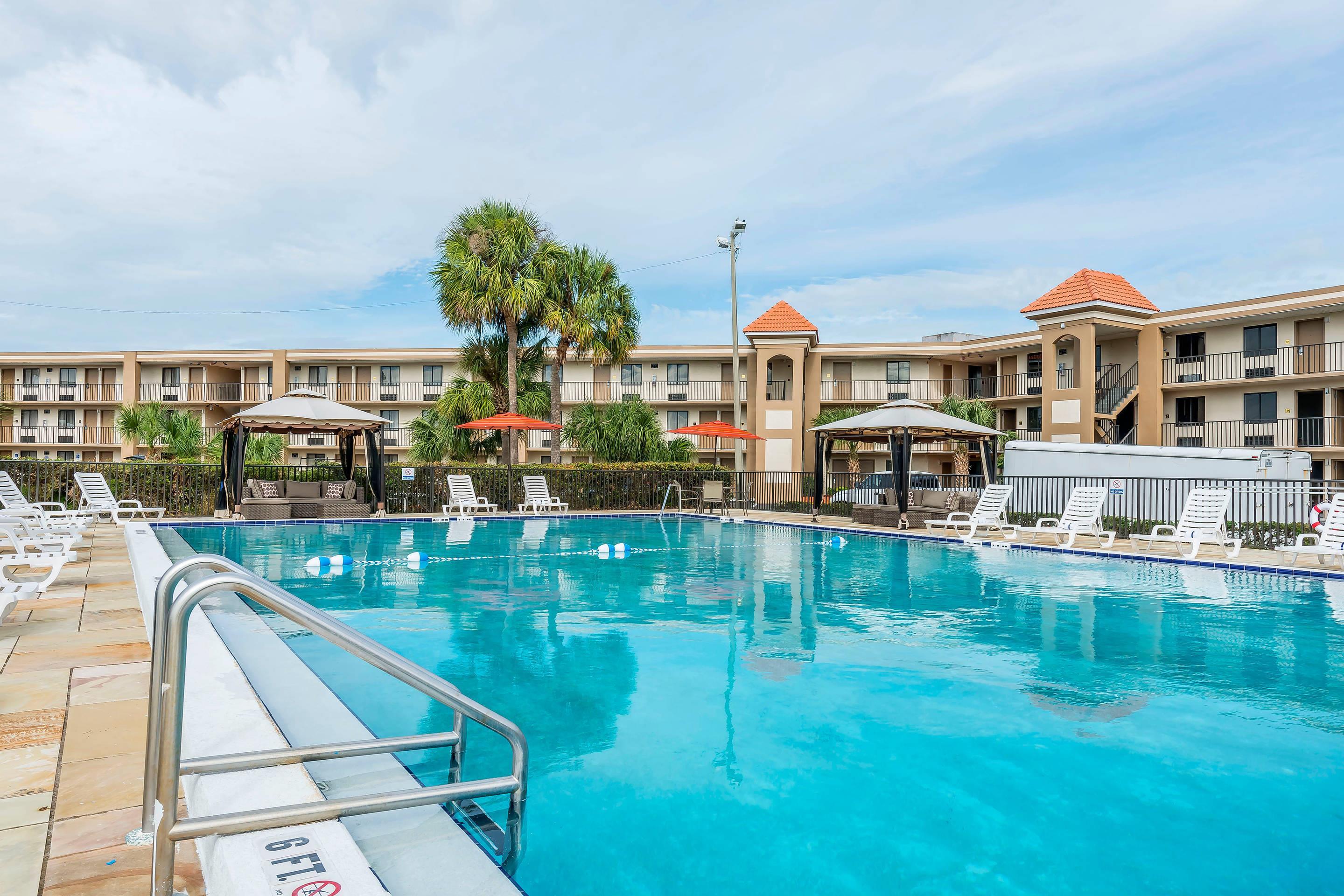 Relax by the pool | Quality Inn & Suites By The Lake
