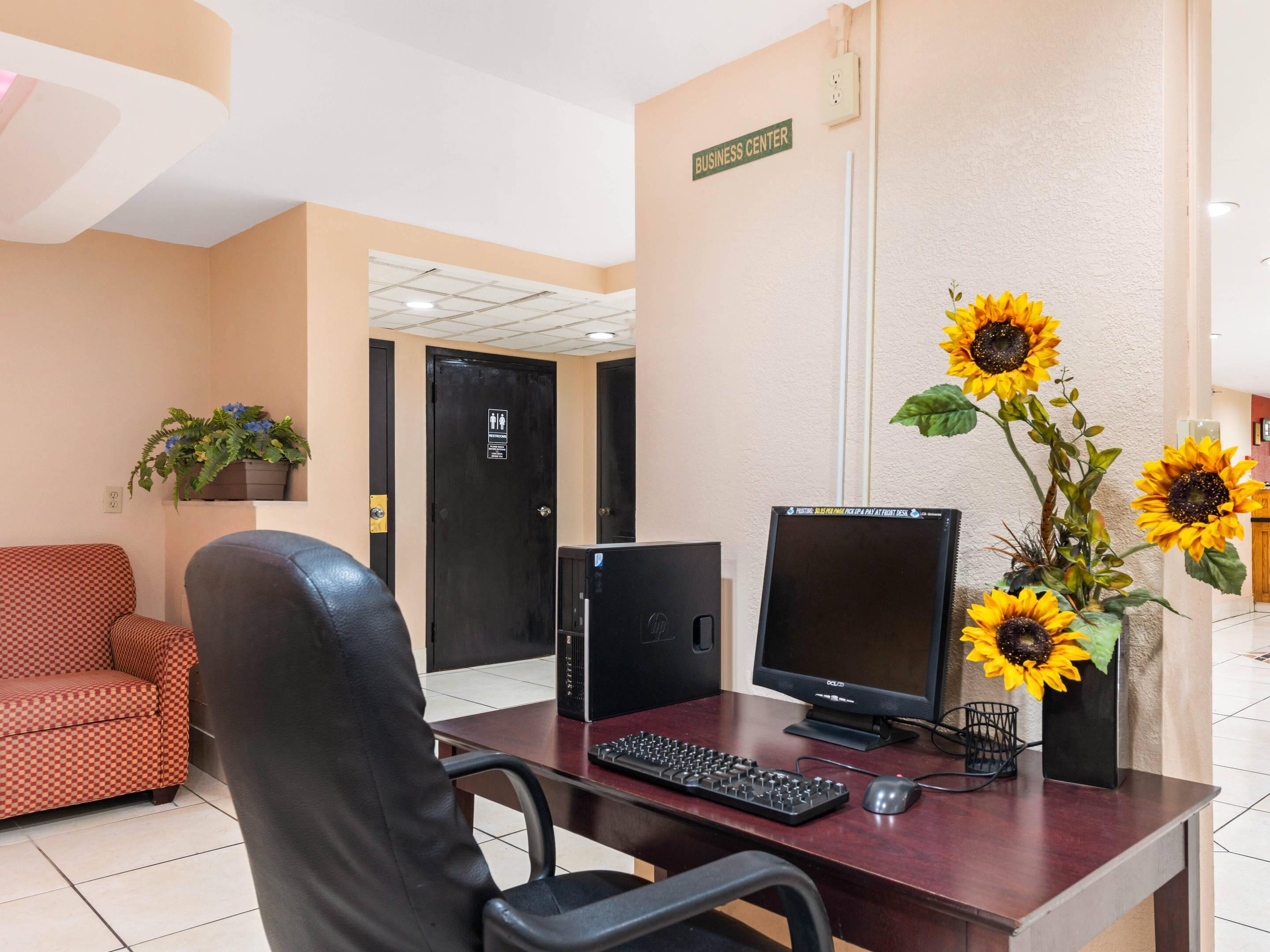 Computer in the lobby | Quality Inn & Suites Orlando Airport
