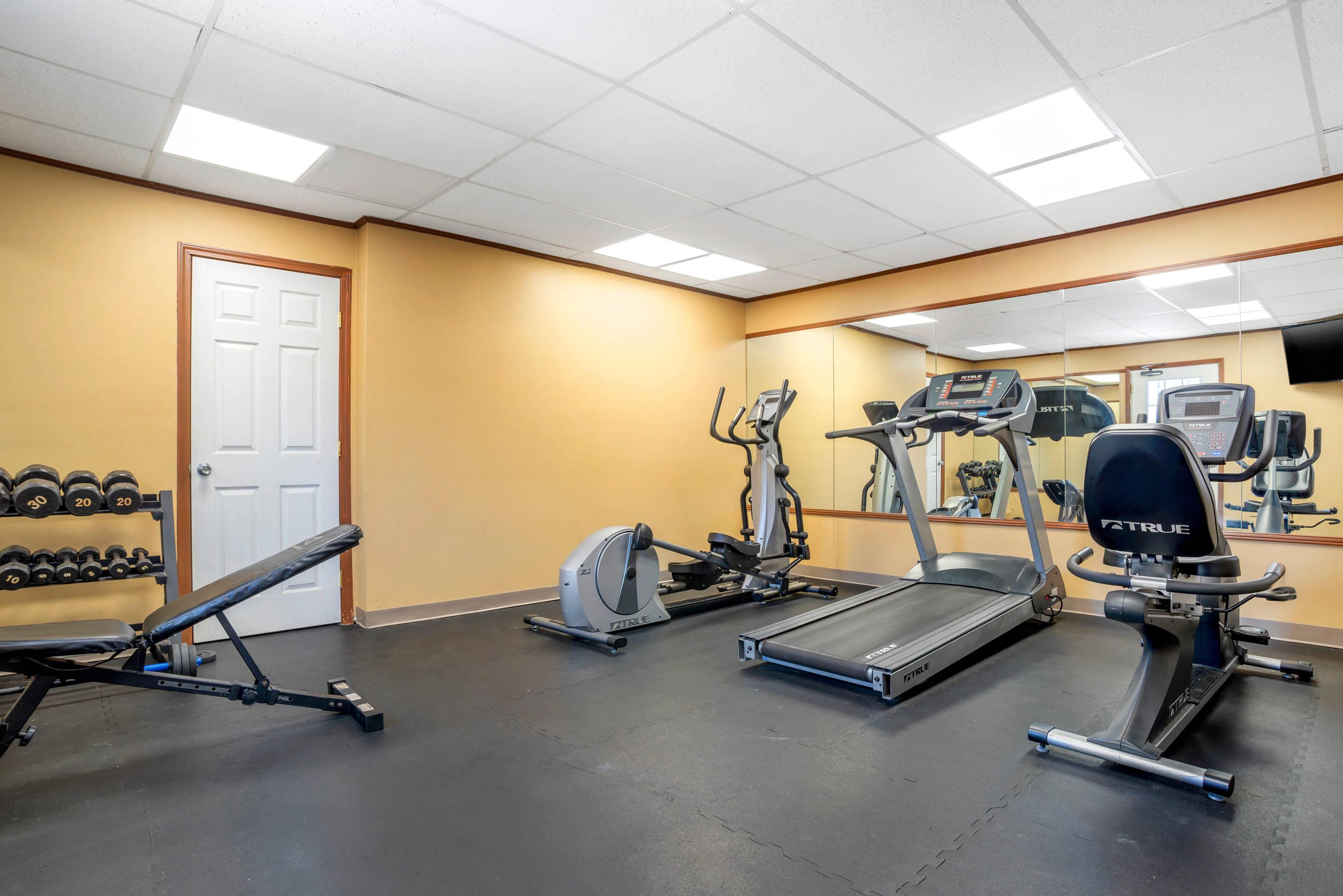 Fitness center with television | Quality Inn & Conference Center