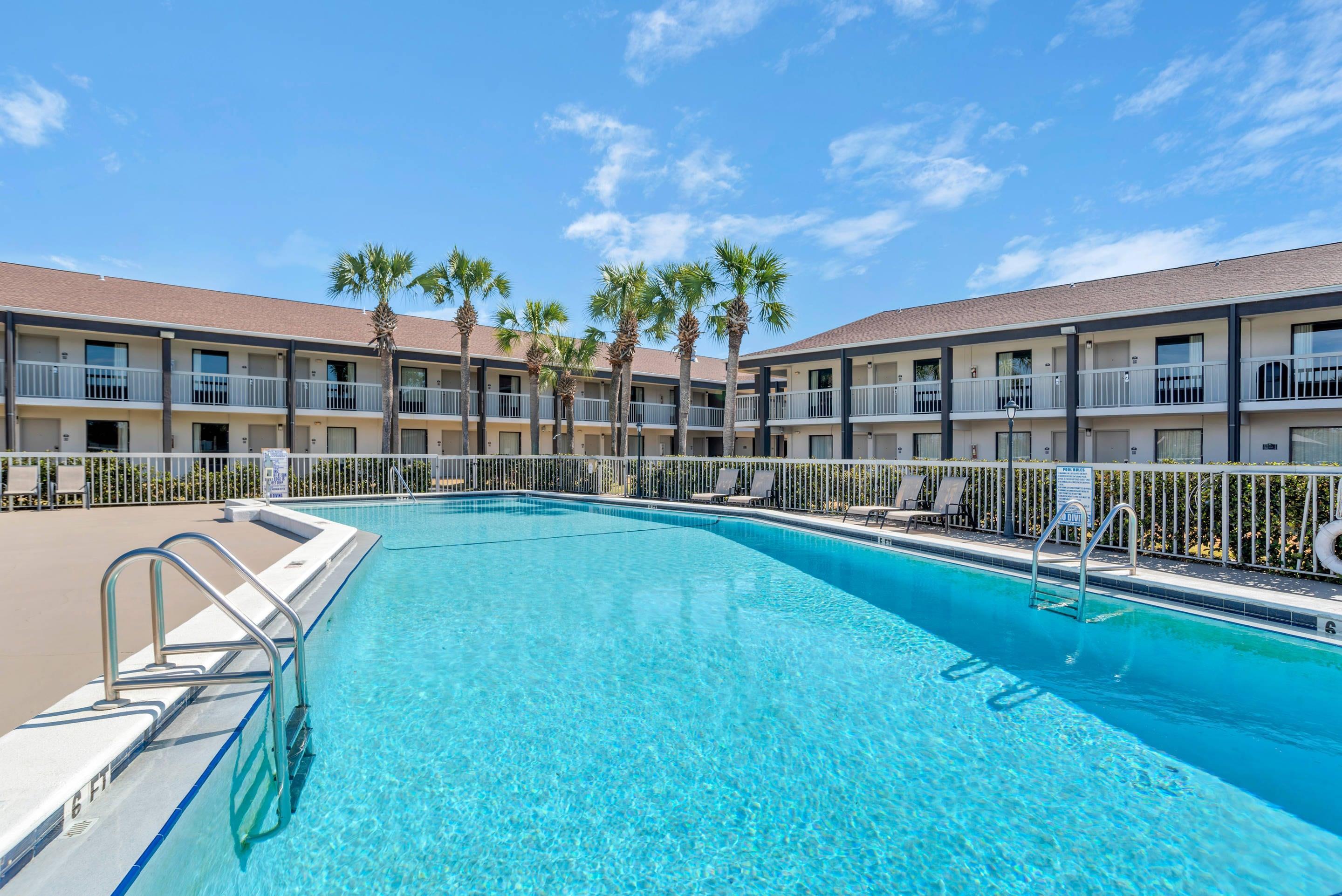 Relax by the pool | Quality Inn & Conference Center