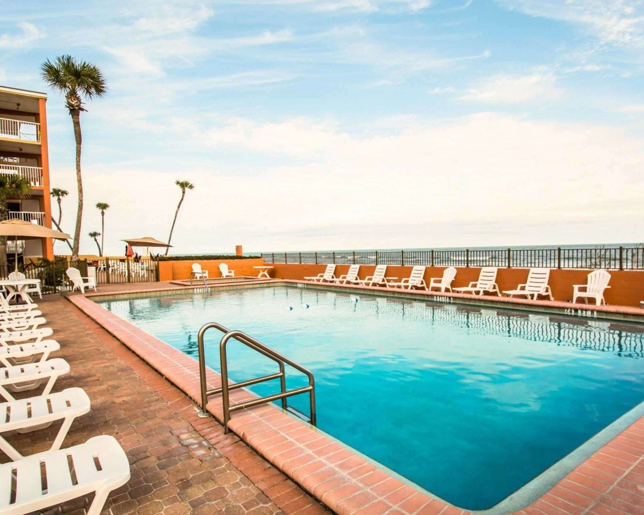 Outdoor pool with beach view