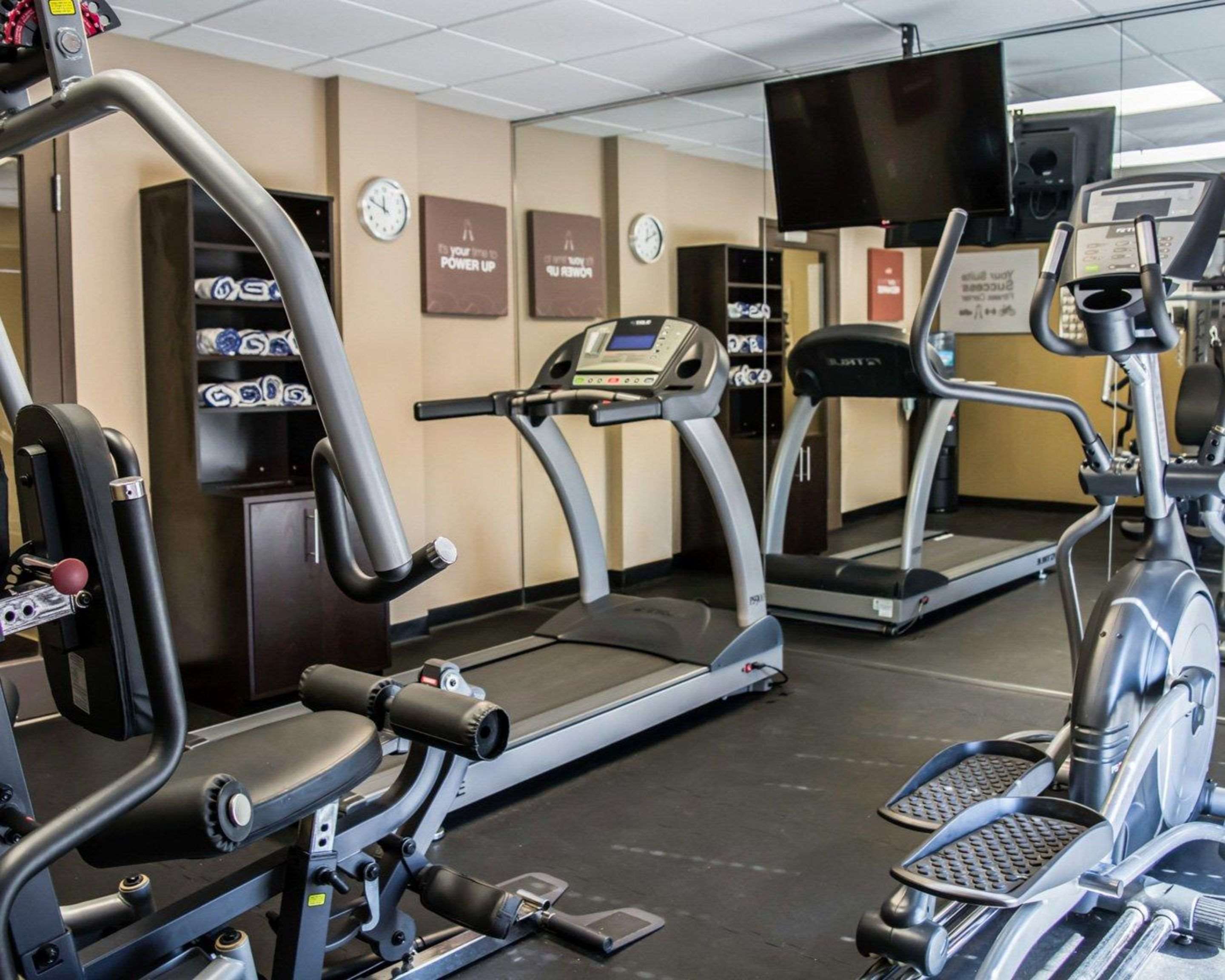 Exercise room with cardio equipment and weights | Comfort Suites Clearwater - Dunedin