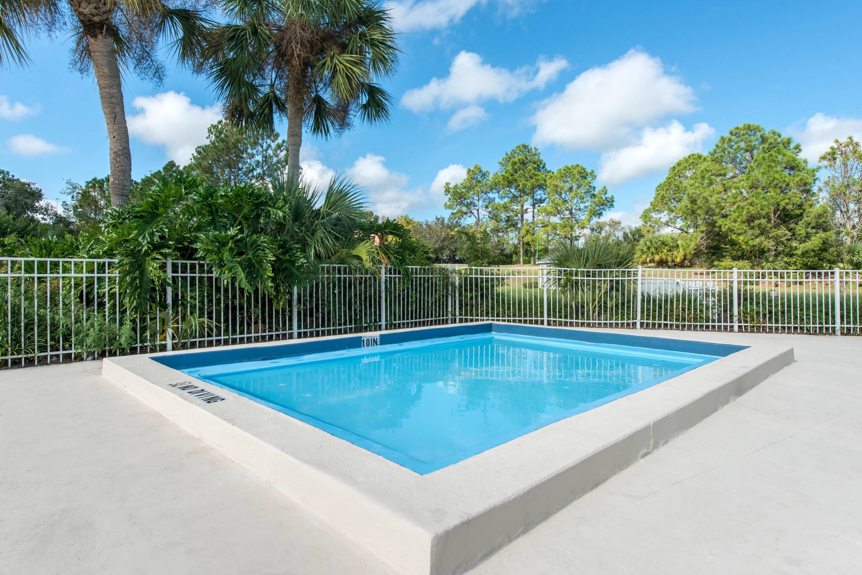 Outdoor pool | Quality Inn & Suites Brooksville I-75/Dade City