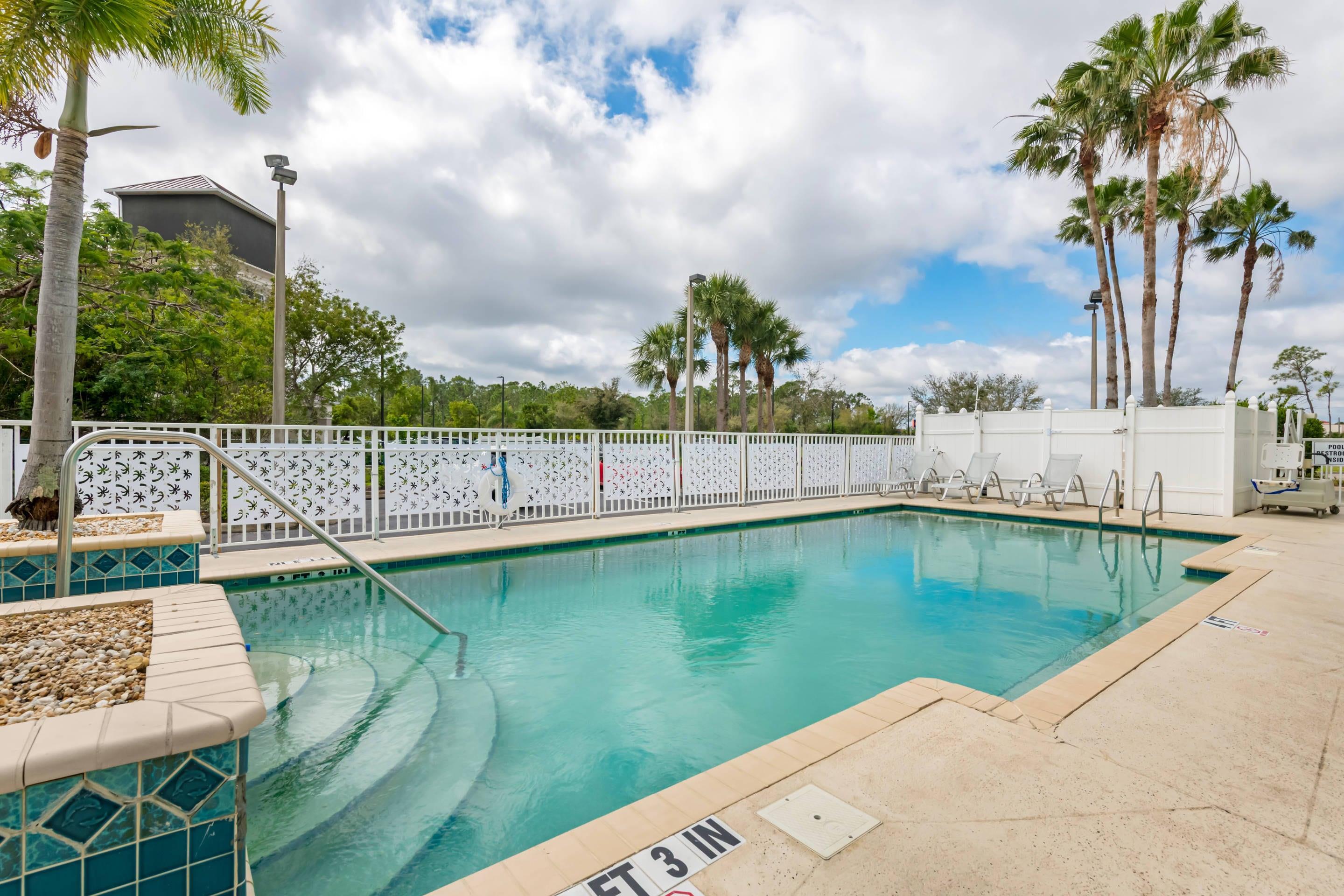 Outdoor pool | Sleep Inn & Suites Port Charlotte - Punta Gorda