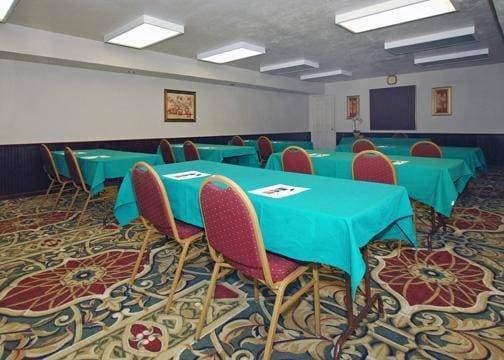 Meeting room with classroom-style setup | Suburban Studios Tallahassee near University