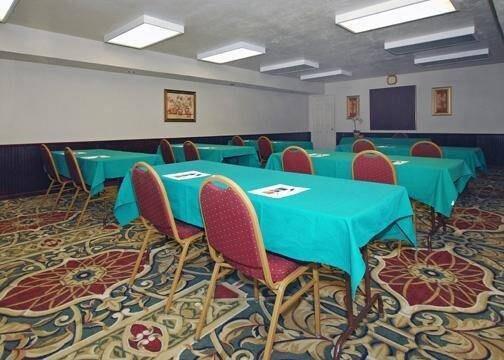 Meeting room with classroom-style setup | Suburban Studios Tallahassee near University