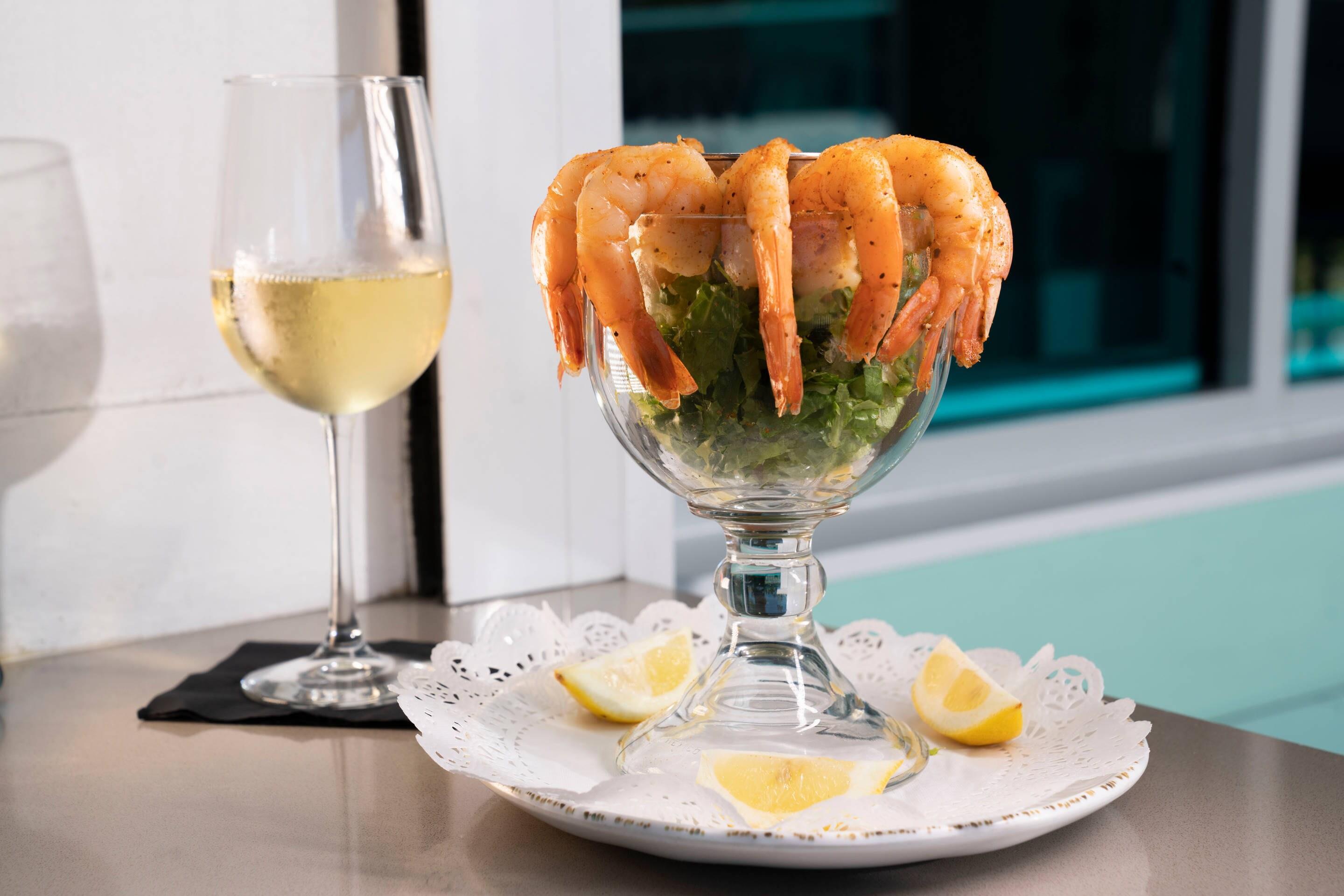 On-site restaurant | Winter the Dolphins Beach Club, Ascend Hotel Collection