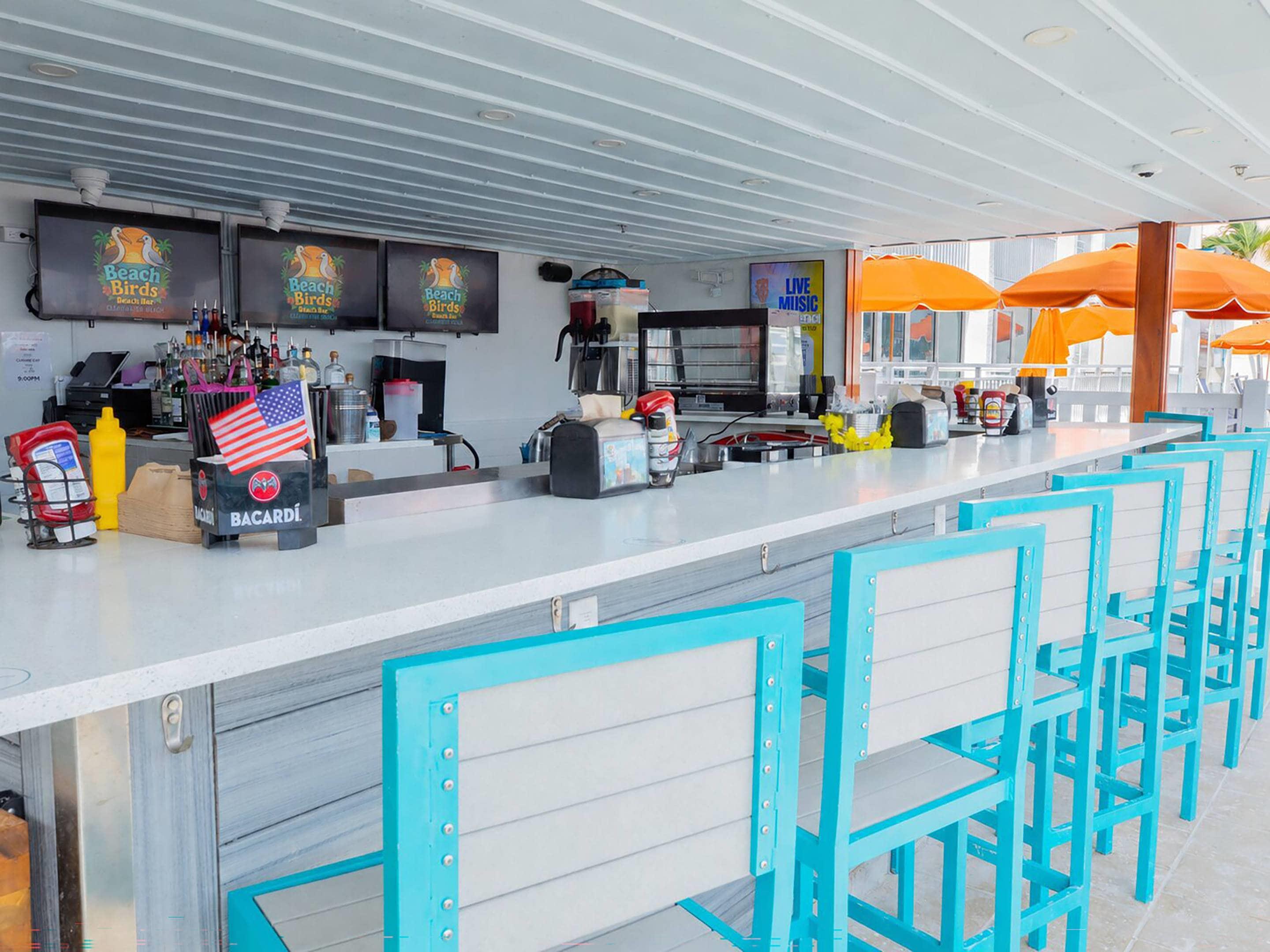 Patio bar | Winter the Dolphins Beach Club, Ascend Hotel Collection