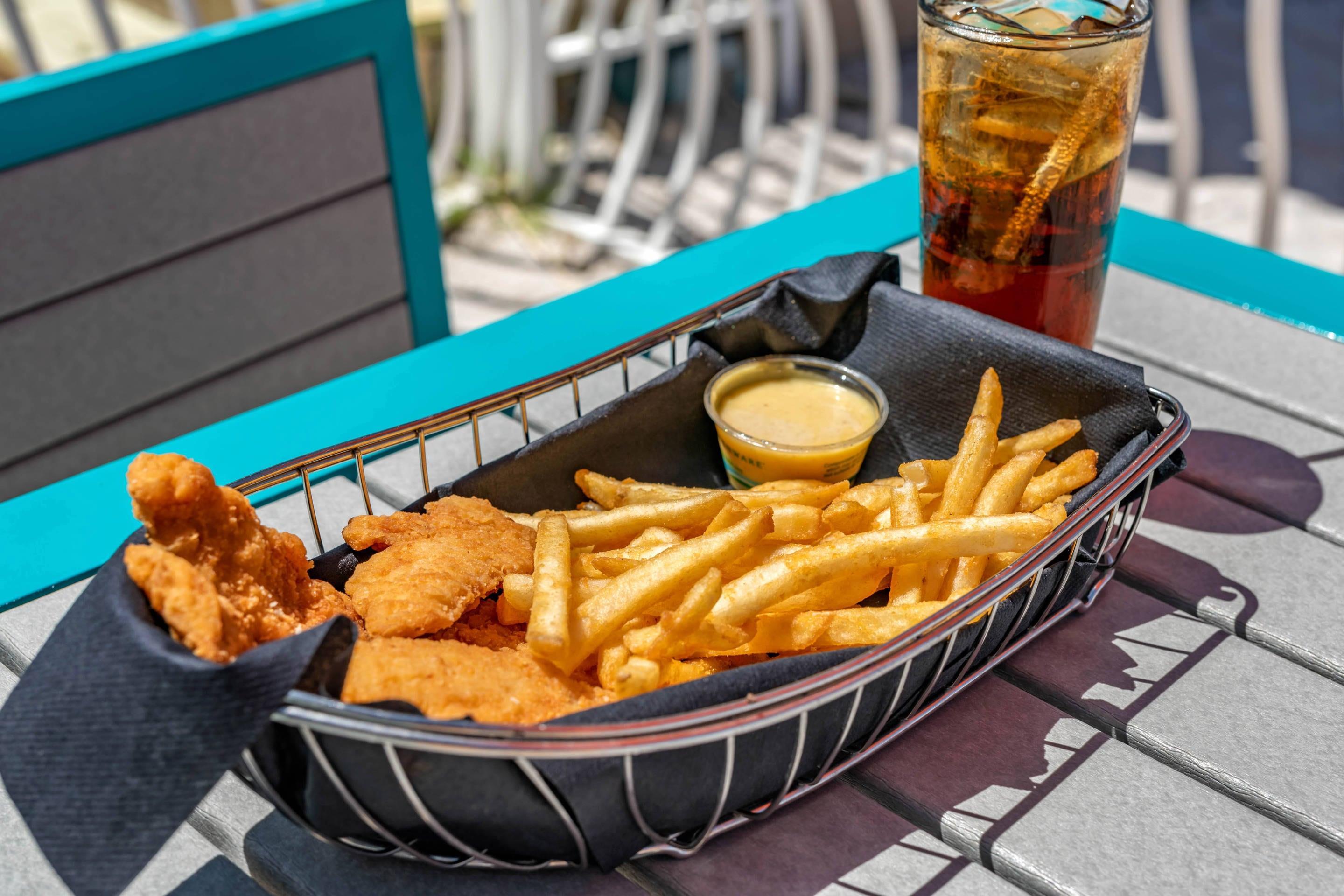 On-site restaurant | Winter the Dolphins Beach Club, Ascend Hotel Collection